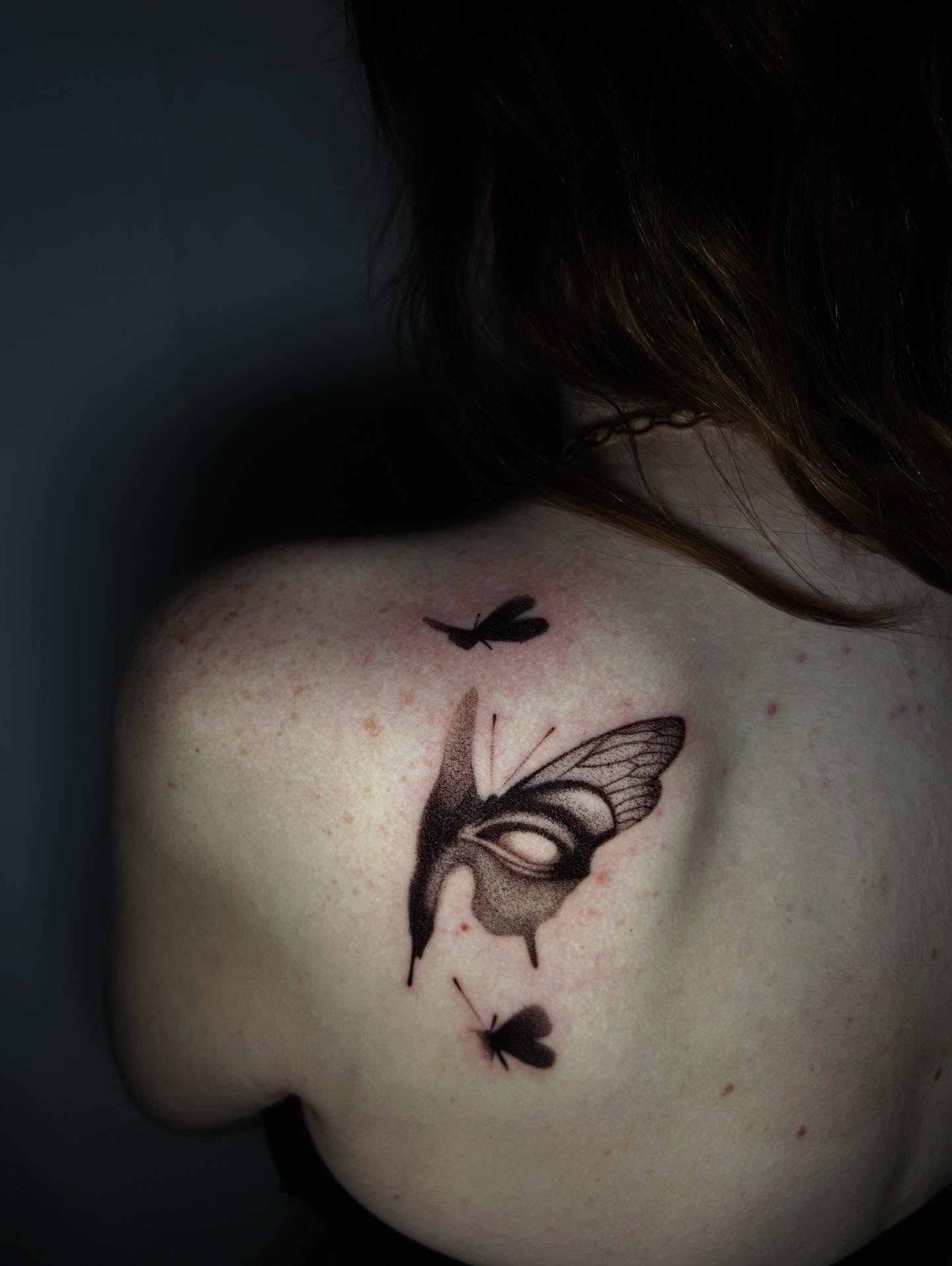 Butterfly black and grey tattoo on the shoulder by J
