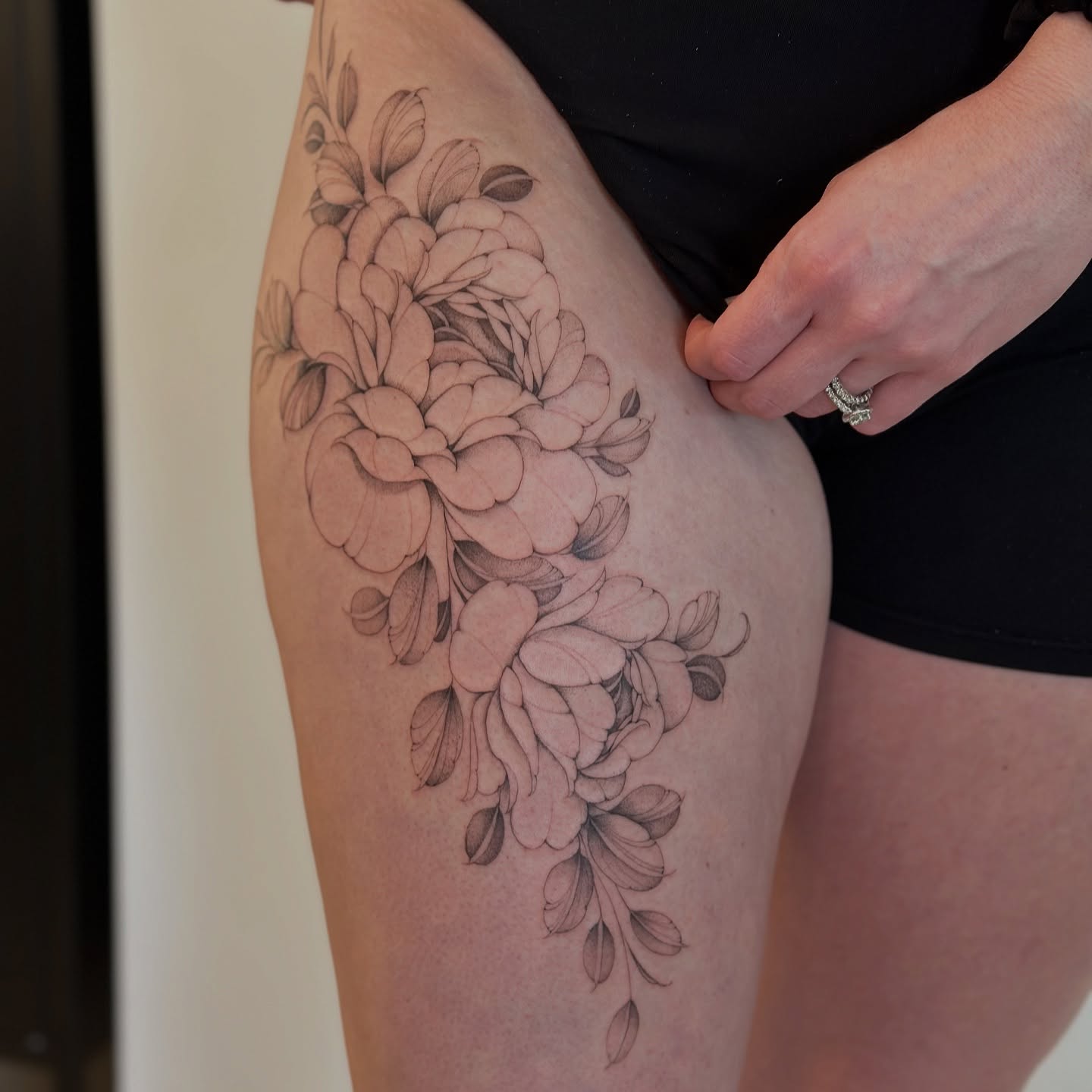 Floral bouquet black and grey tattoo on the thigh by ᴍɪᴄʜᴇʟʟᴇ, New York, New York