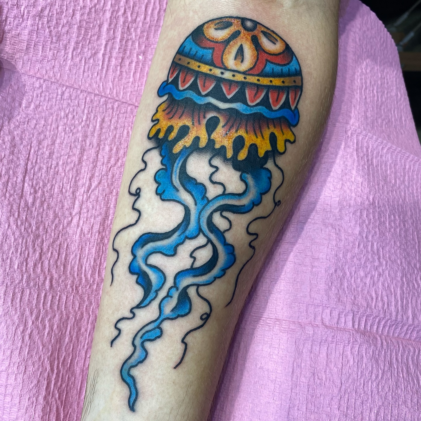 Jellyfish new school tattoo on the forearm by @katie_tatts