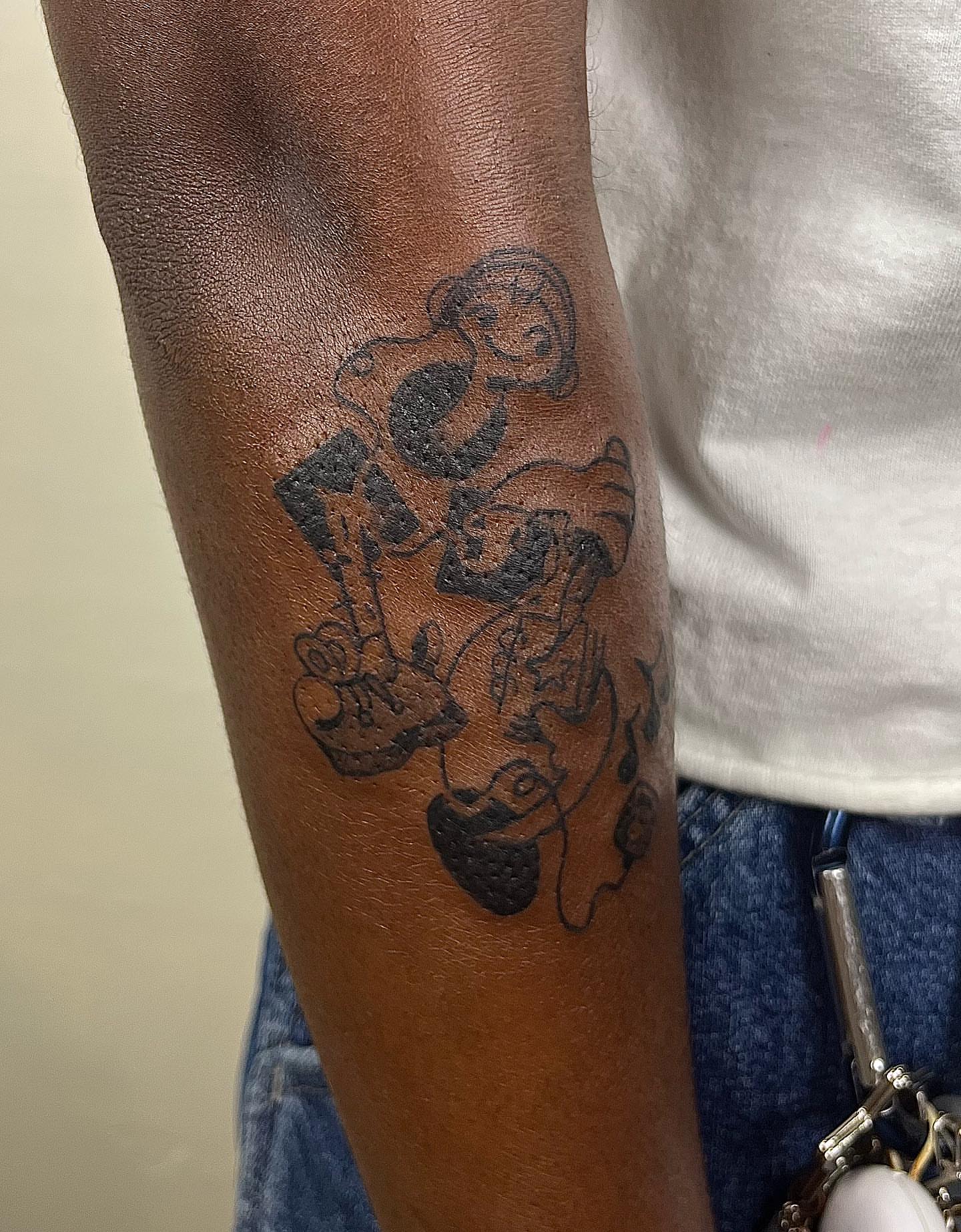Monkeys black and grey tattoo on the forearm by luce elias :