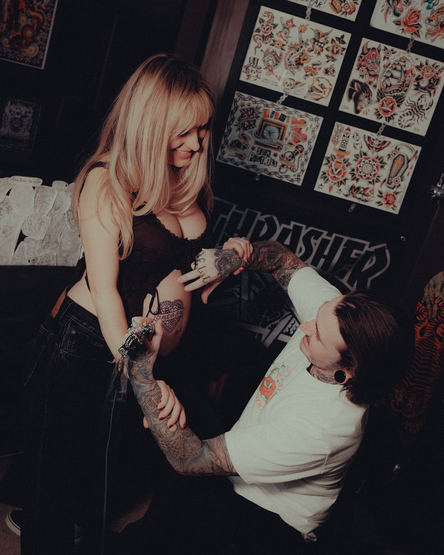 Tattoo artist and client American traditional tattoo on the upper arm by Jordan Allen