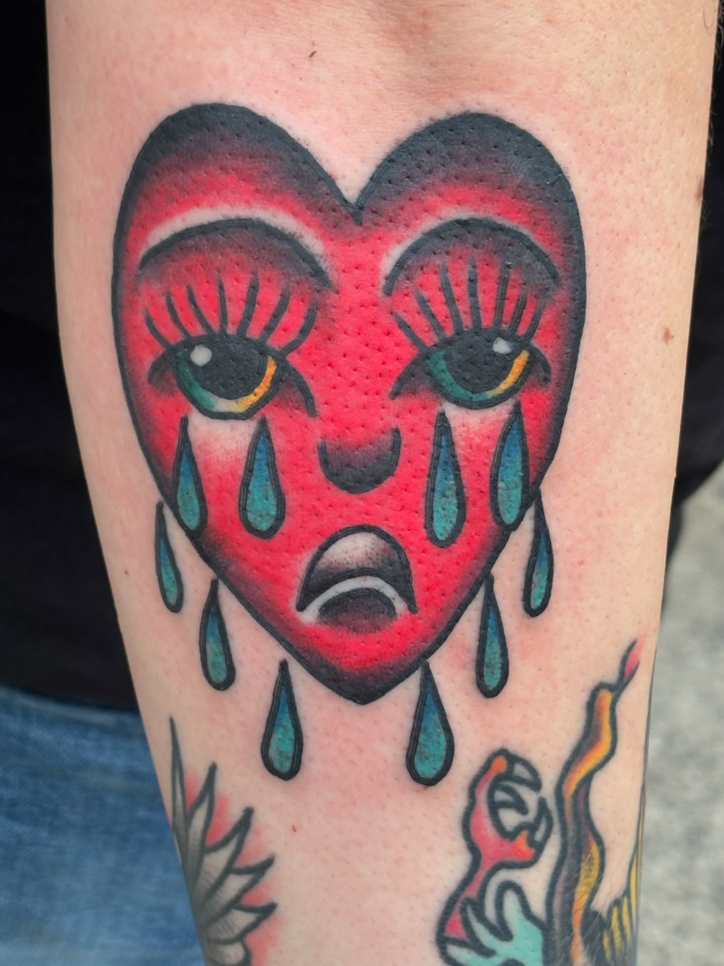 Crying heart American traditional tattoo on the forearm by Francis Cassidy