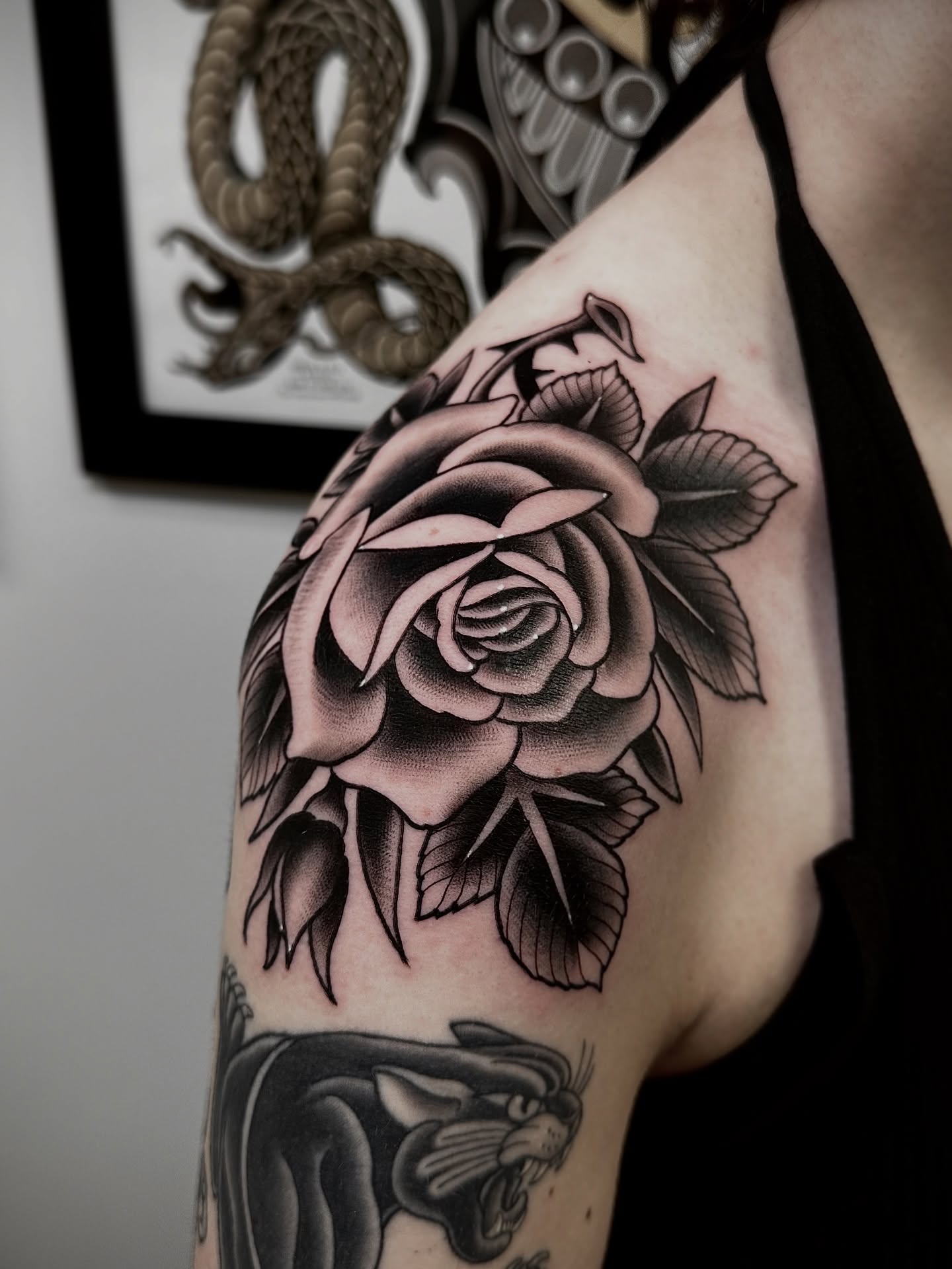 Rose black and grey tattoo on the shoulder by Patrick Whiting