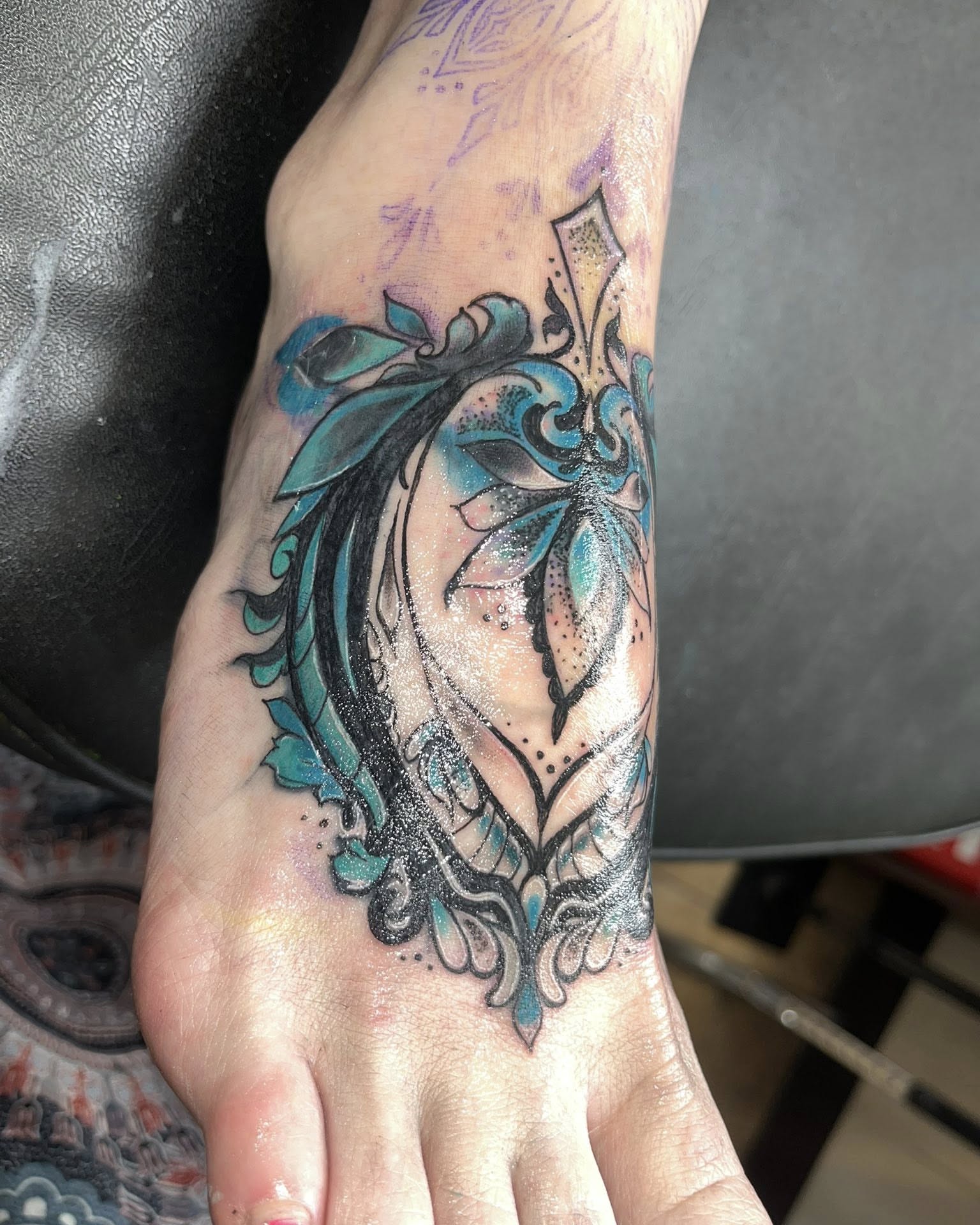 Floral ornamental tattoo on the foot by Jessica DarkRabbit