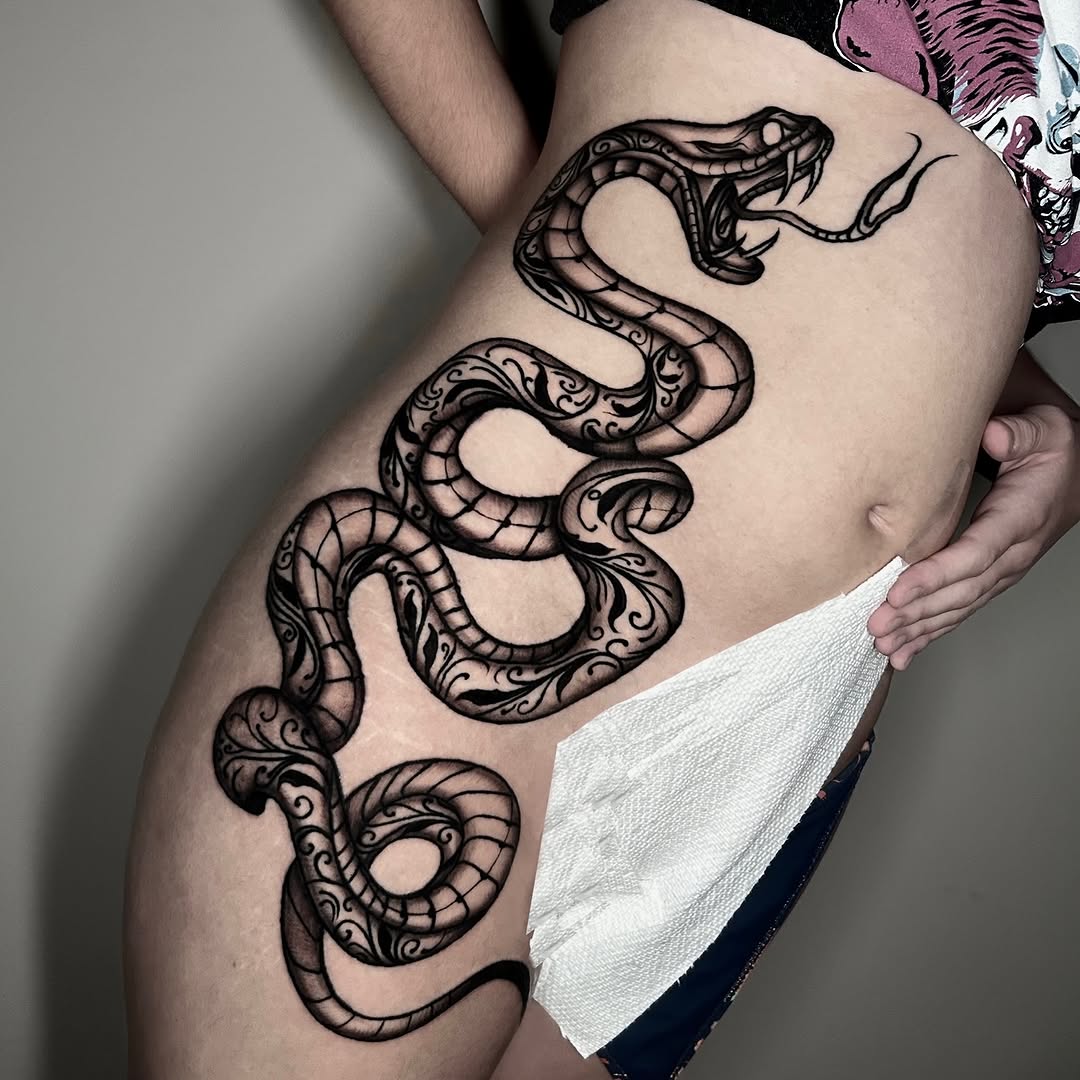 Tattoo by @monarch.tattoos — blackwork, ornamental