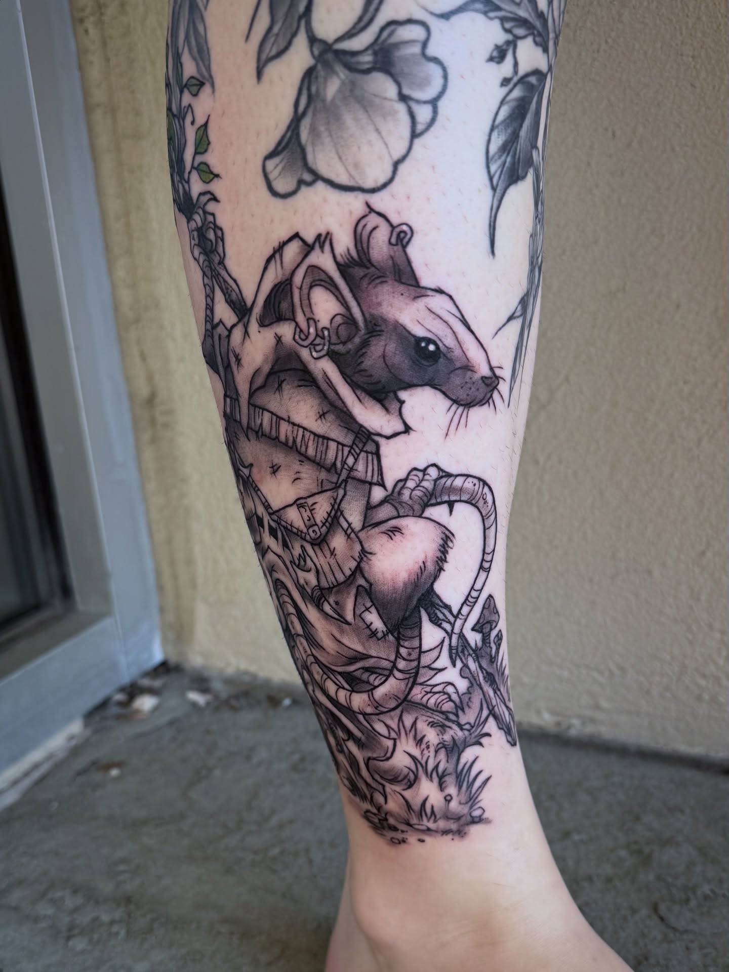 Rat and mechanical elements realism tattoo on the forearm by Michael Langdale