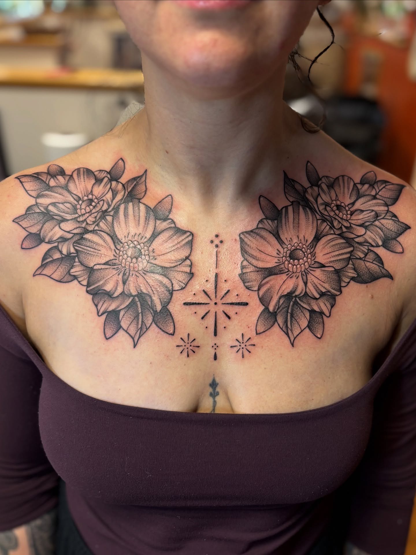 Flowers dotwork tattoo on the chest by Dee - MA Tattoo Artist, Concord, Massachusetts