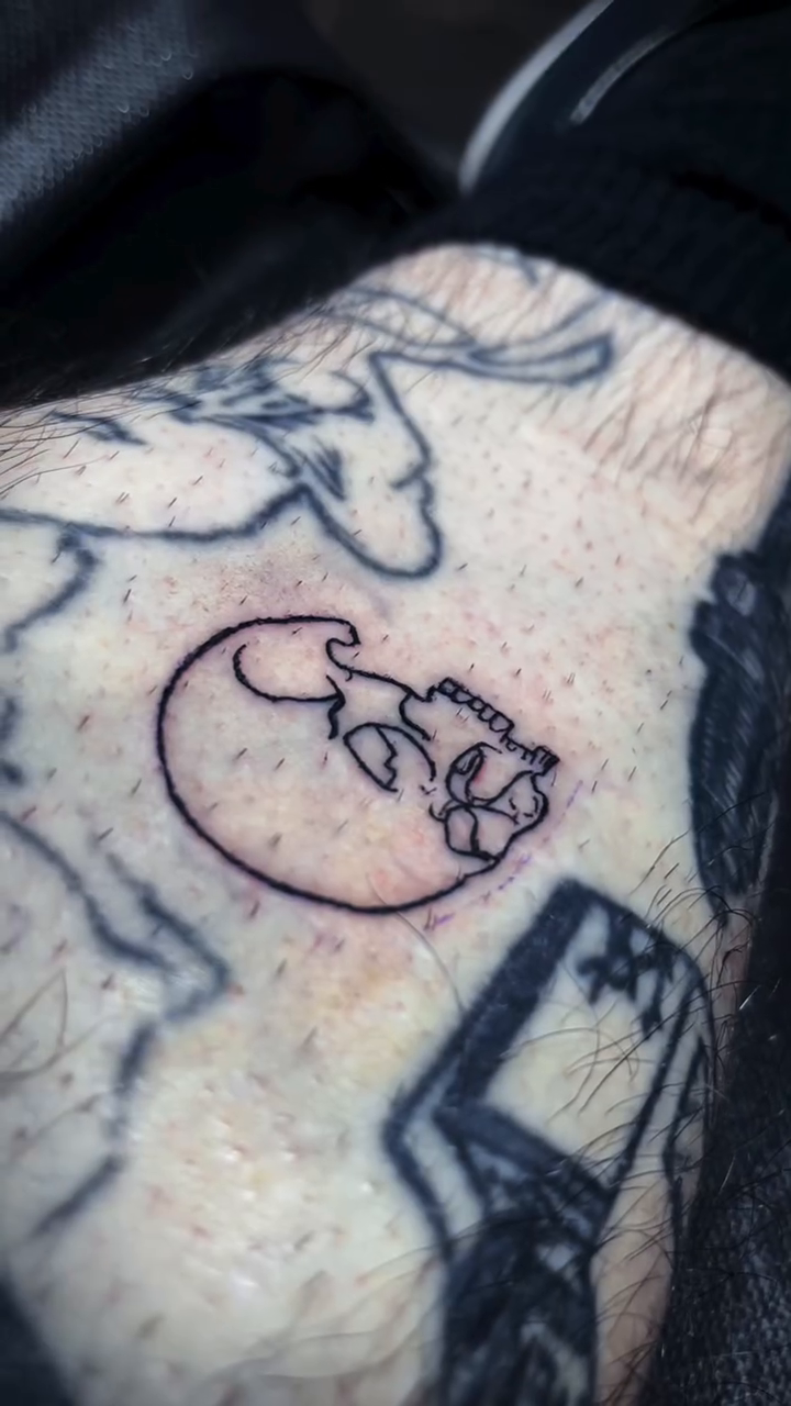 Cat playing guitar realism tattoo on the upper arm by Juliette :D
