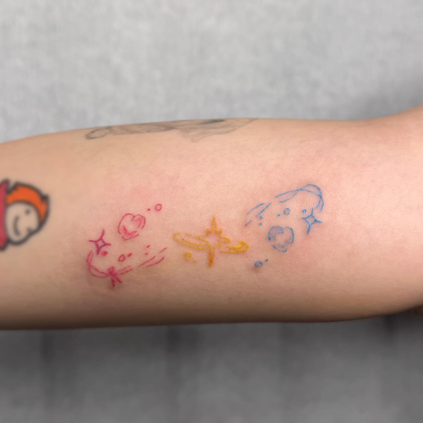 Stars and planets dotwork tattoo on the forearm by Yez tattoo