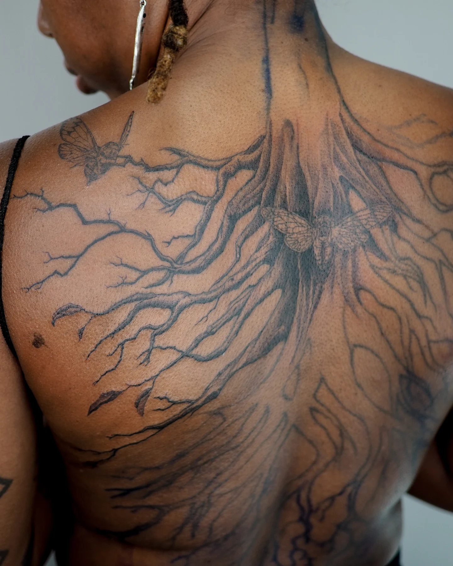 Tree and butterflies realism tattoo on the back by MK