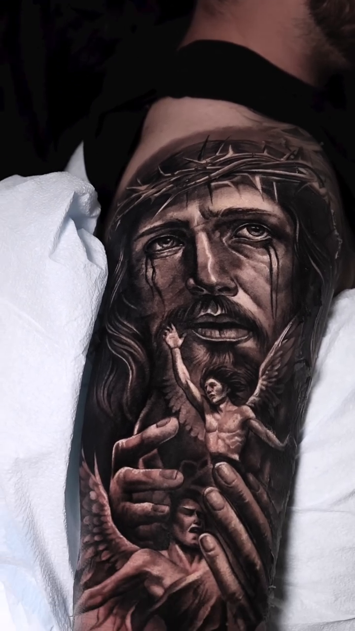 Jesus Christ with angels and demons realism tattoo by Ali Saleh 🇱🇧 Detroit Tattoo Artist, Dearborn, Michigan