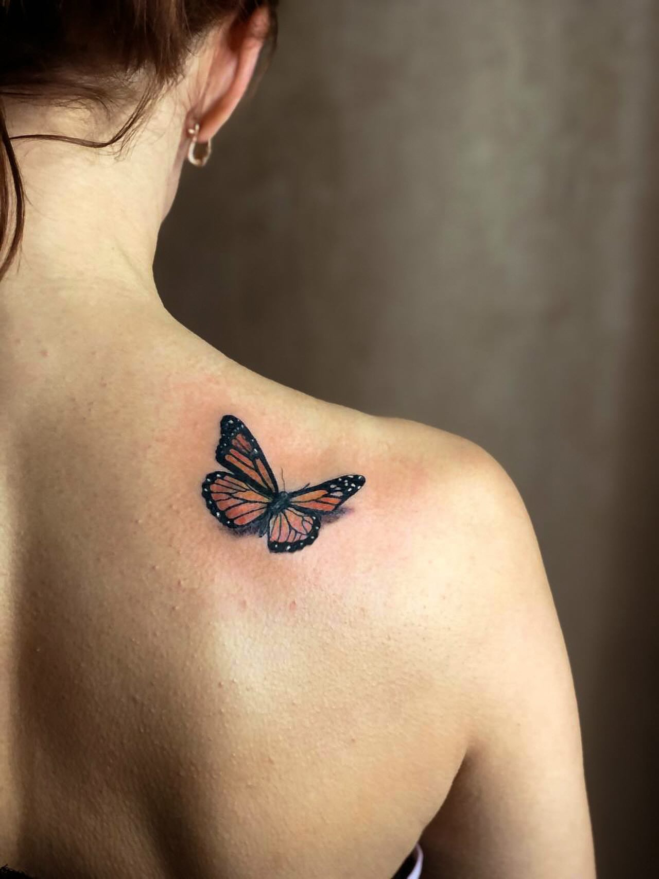 Monarch butterfly realism tattoo on the shoulder by Артем Летний