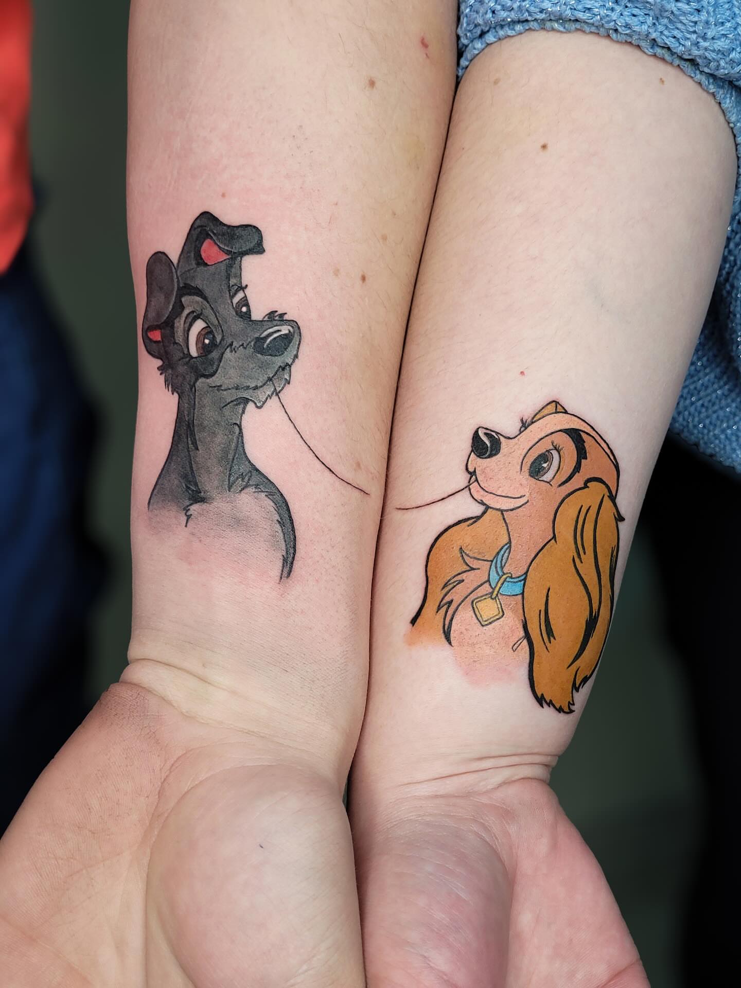 Lady and the tramp realism tattoo on the forearm by Артем Летний