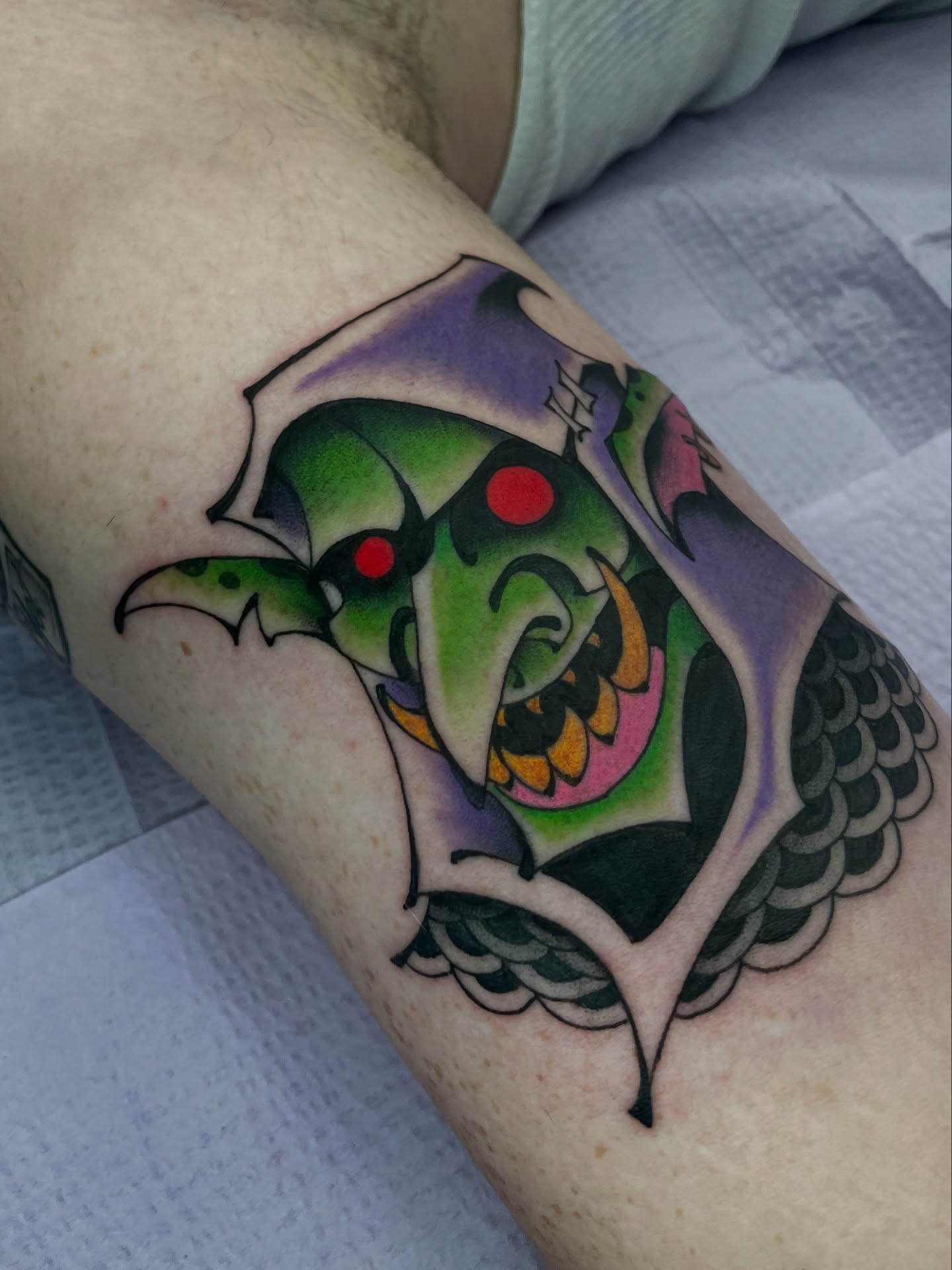Koi fish American traditional tattoo on the forearm by Bryan Ortega