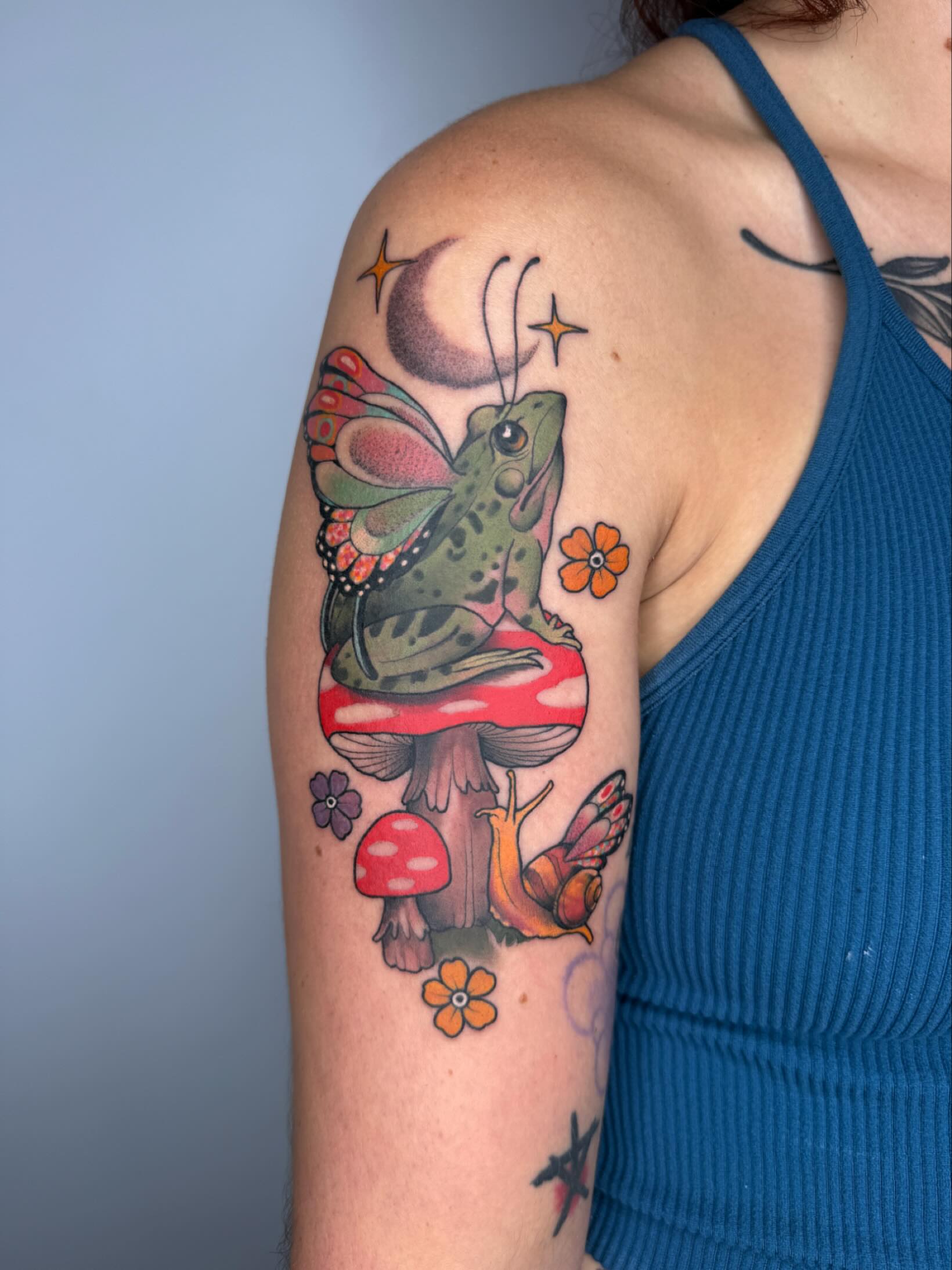 Frog and butterfly American traditional tattoo on the shoulder by Samantha Compasso Ford