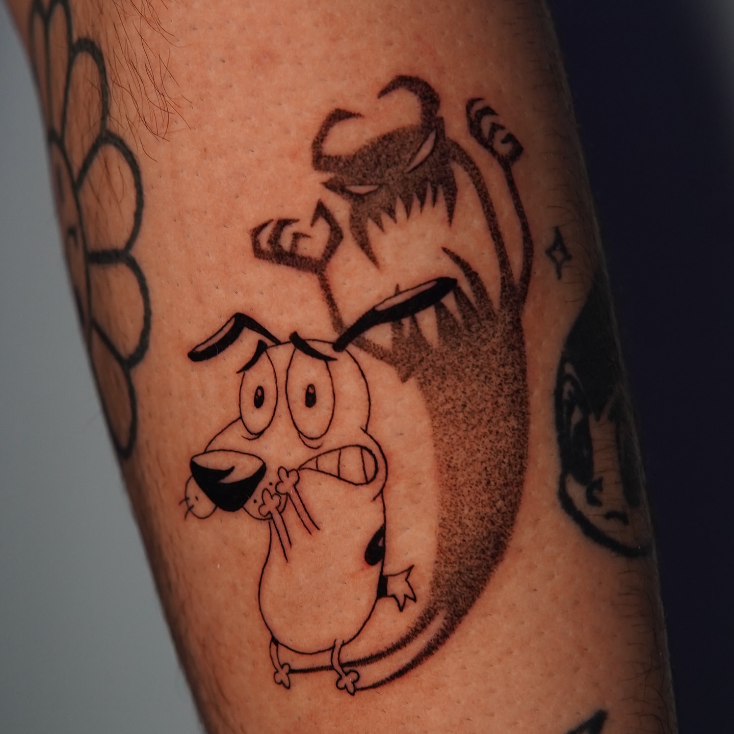 Dog and bear dotwork tattoo on the forearm by Marissa S., Lansing, Michigan