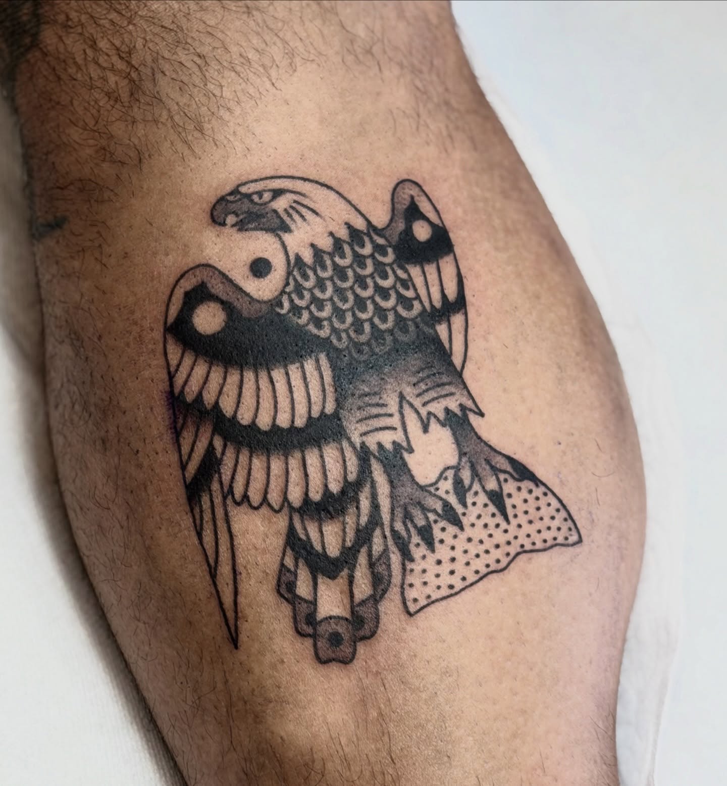 Eagle dotwork tattoo on the thigh by Maks