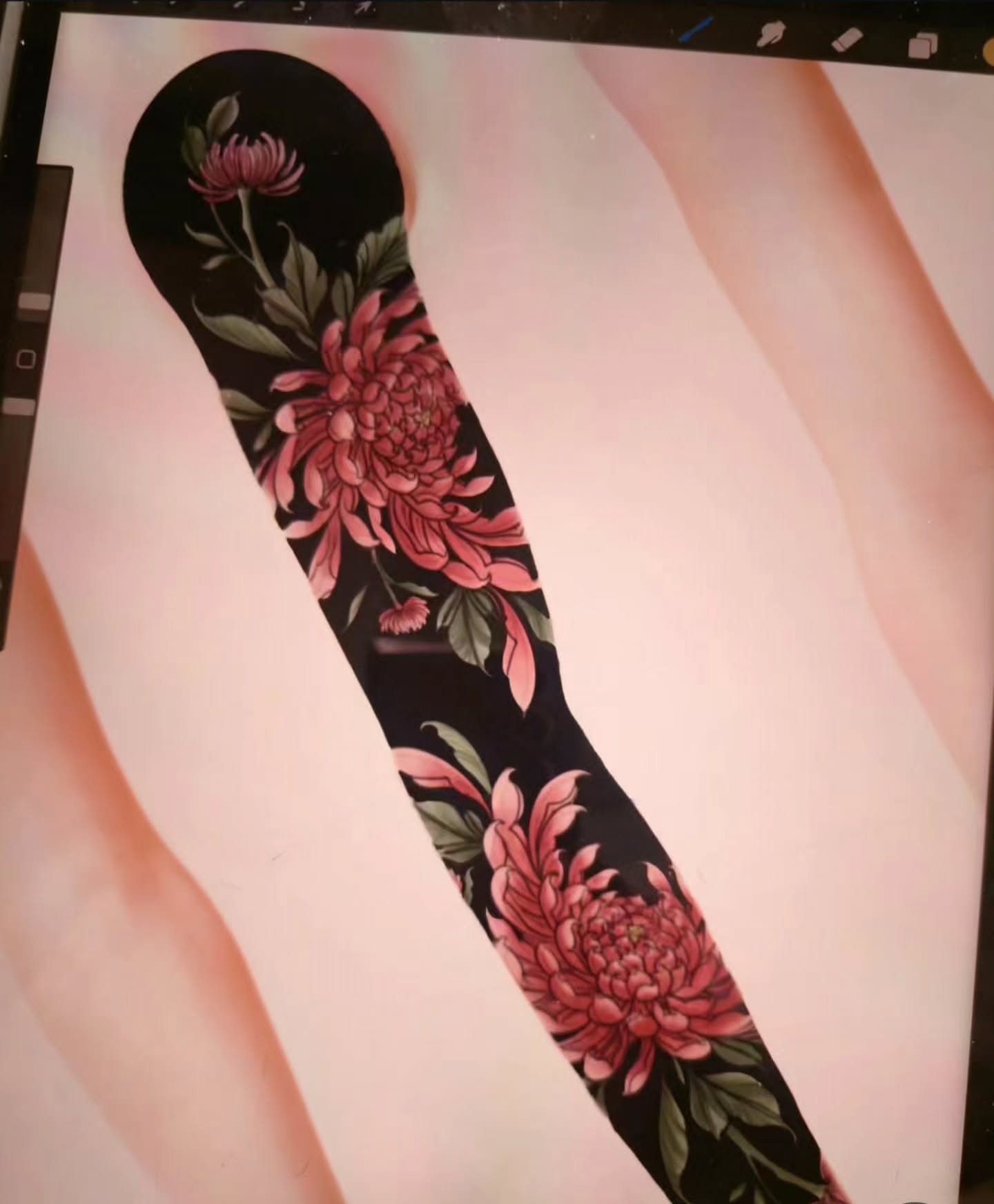 Chrysanthemums black and grey tattoo on the forearm by Barrett Handel