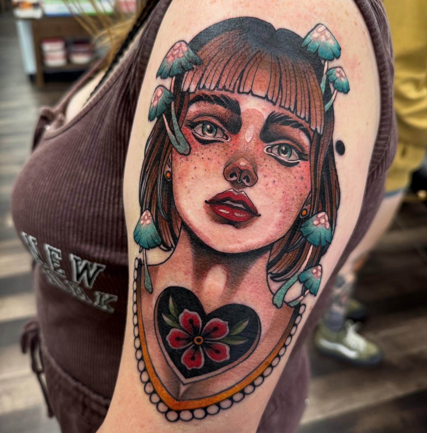Portrait of a girl realism tattoo on the shoulder by Spencer Webb