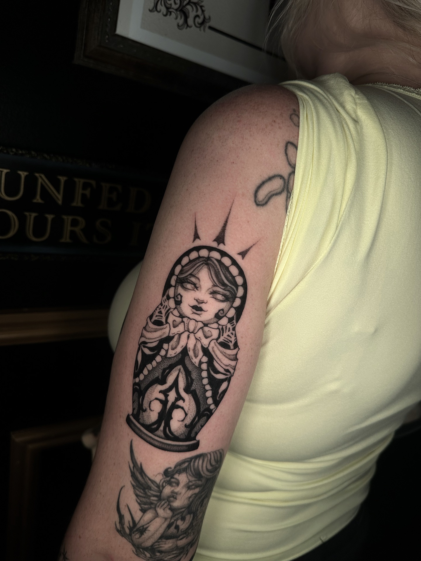 Matryoshka doll black and grey tattoo on the forearm by ๐ฎ๐๐๐ ๐ท๐๐๐๐ ๐ฑ๐๐๐๐๐