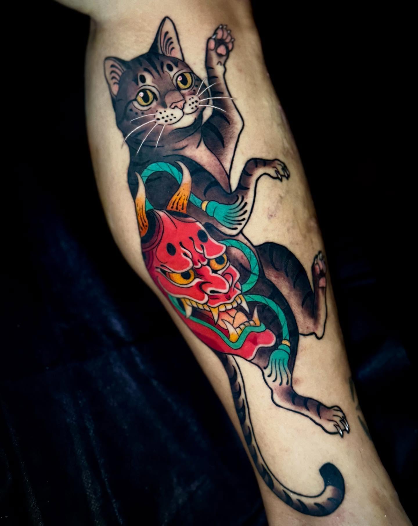 Cat and demon American traditional tattoo on the forearm by Andi Fitz ✨ San Diego Tattoo Artist, San Diego, California