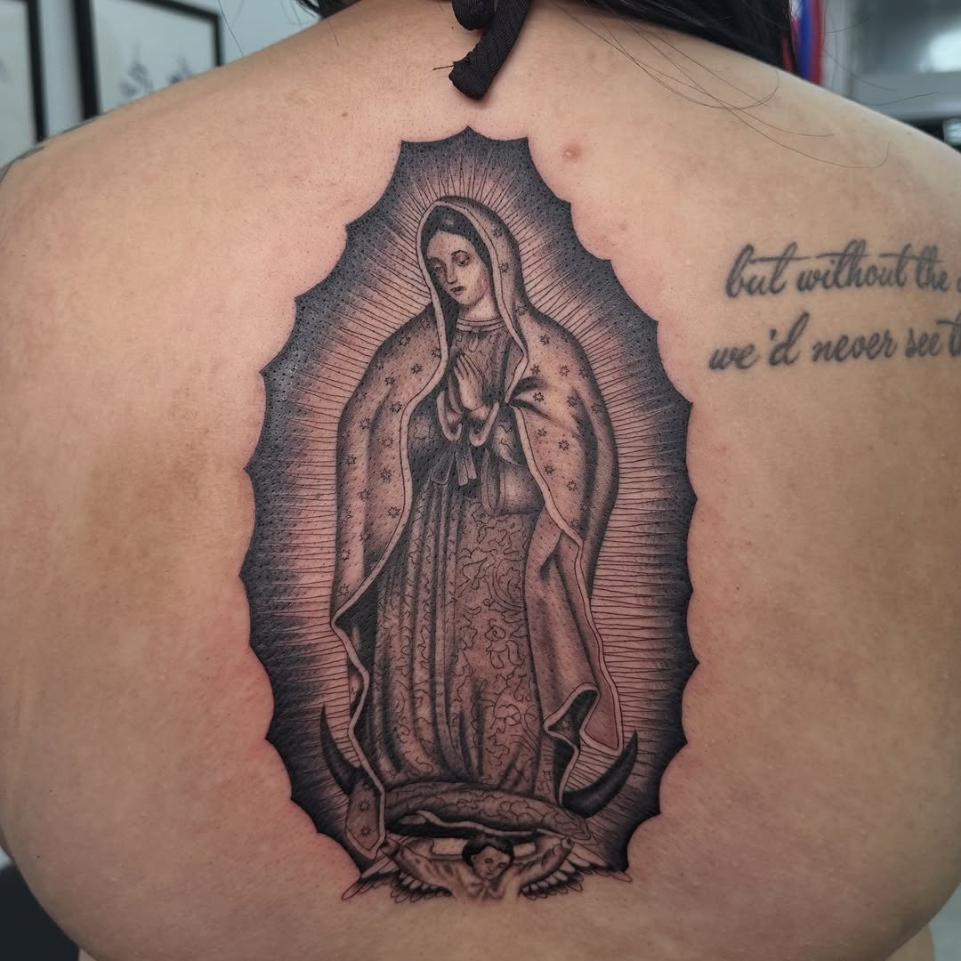 Virgin Mary Chicano tattoo on the back by christina diaz