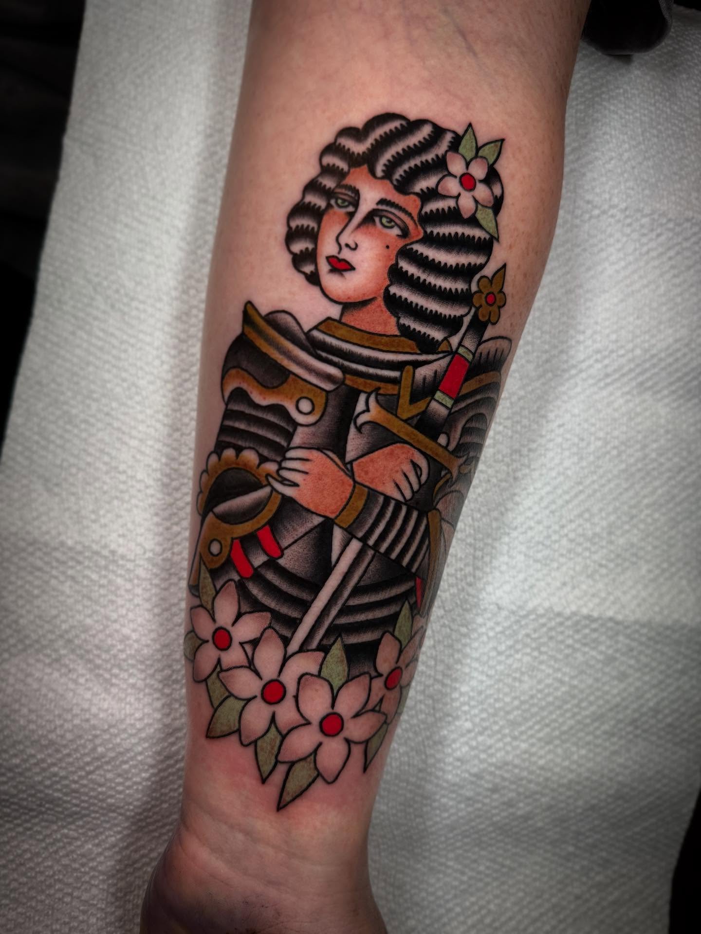 Woman in armor American traditional tattoo on the forearm by Collin Rigsby, Minneapolis, Minnesota