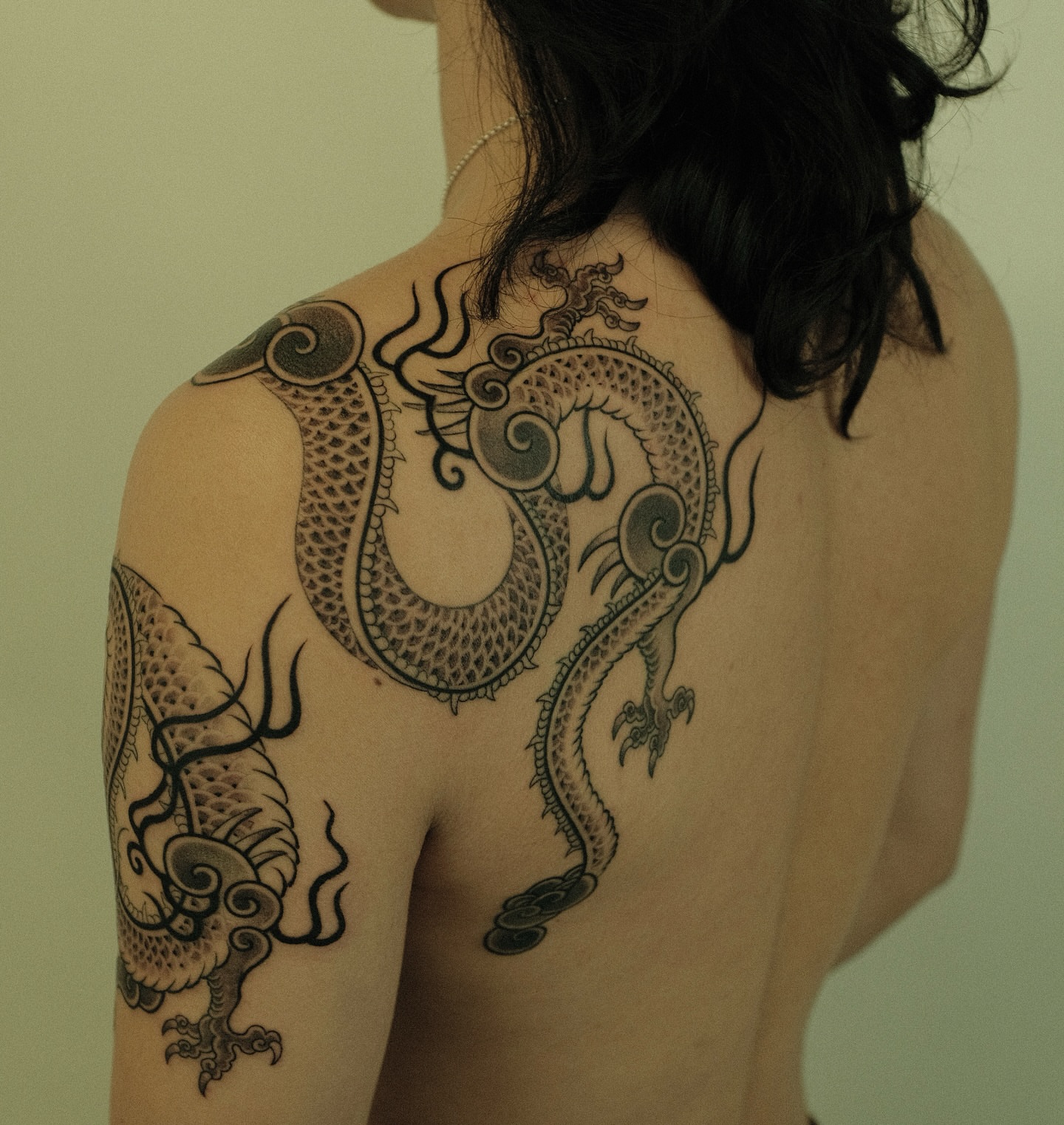 Tattoo by @xiaolun_tatt — black_and_grey