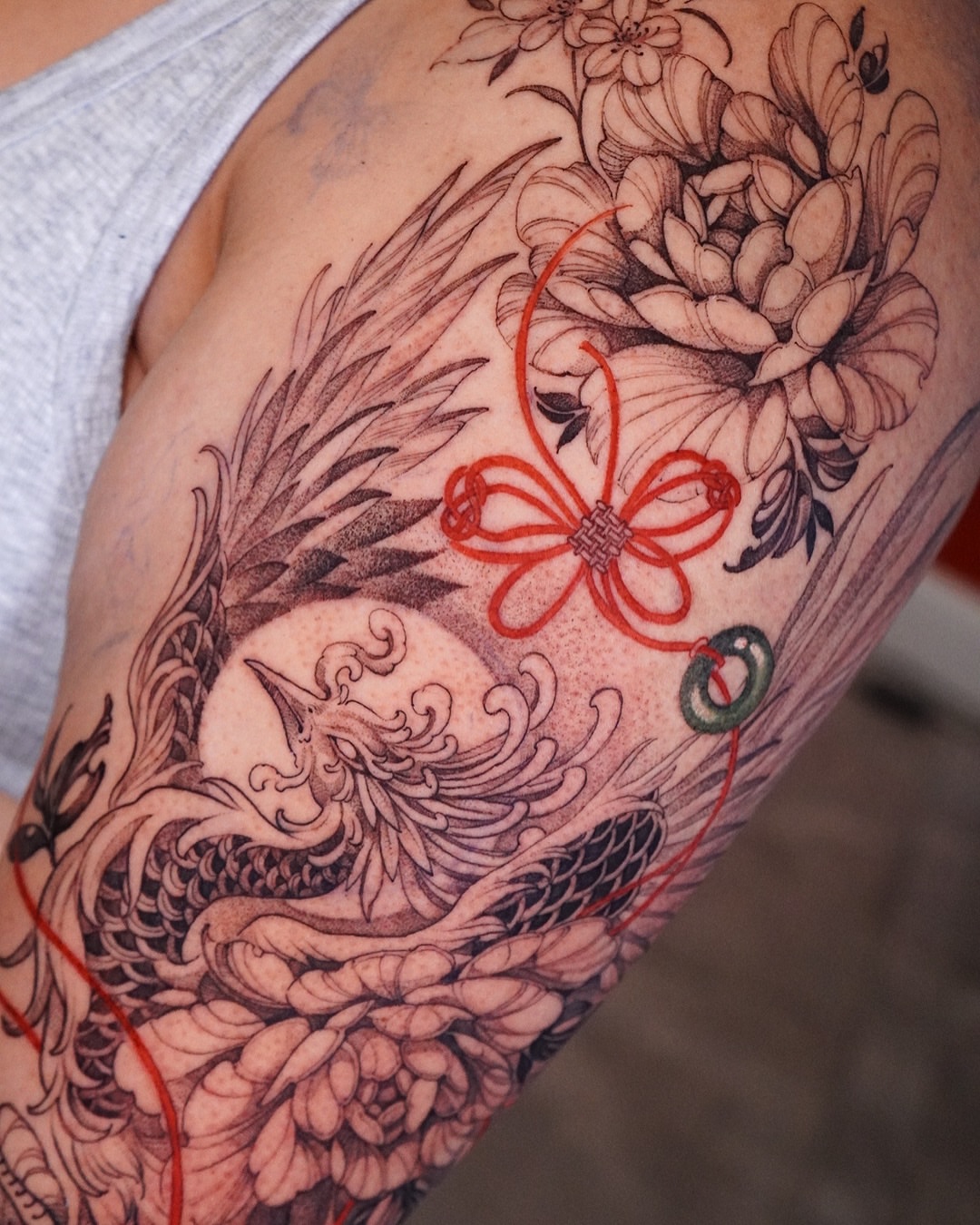 Dragon and flowers japanese irezumi tattoo on the upper arm by 🌛 Lê Huỳnh🌜, Dallas, Texas