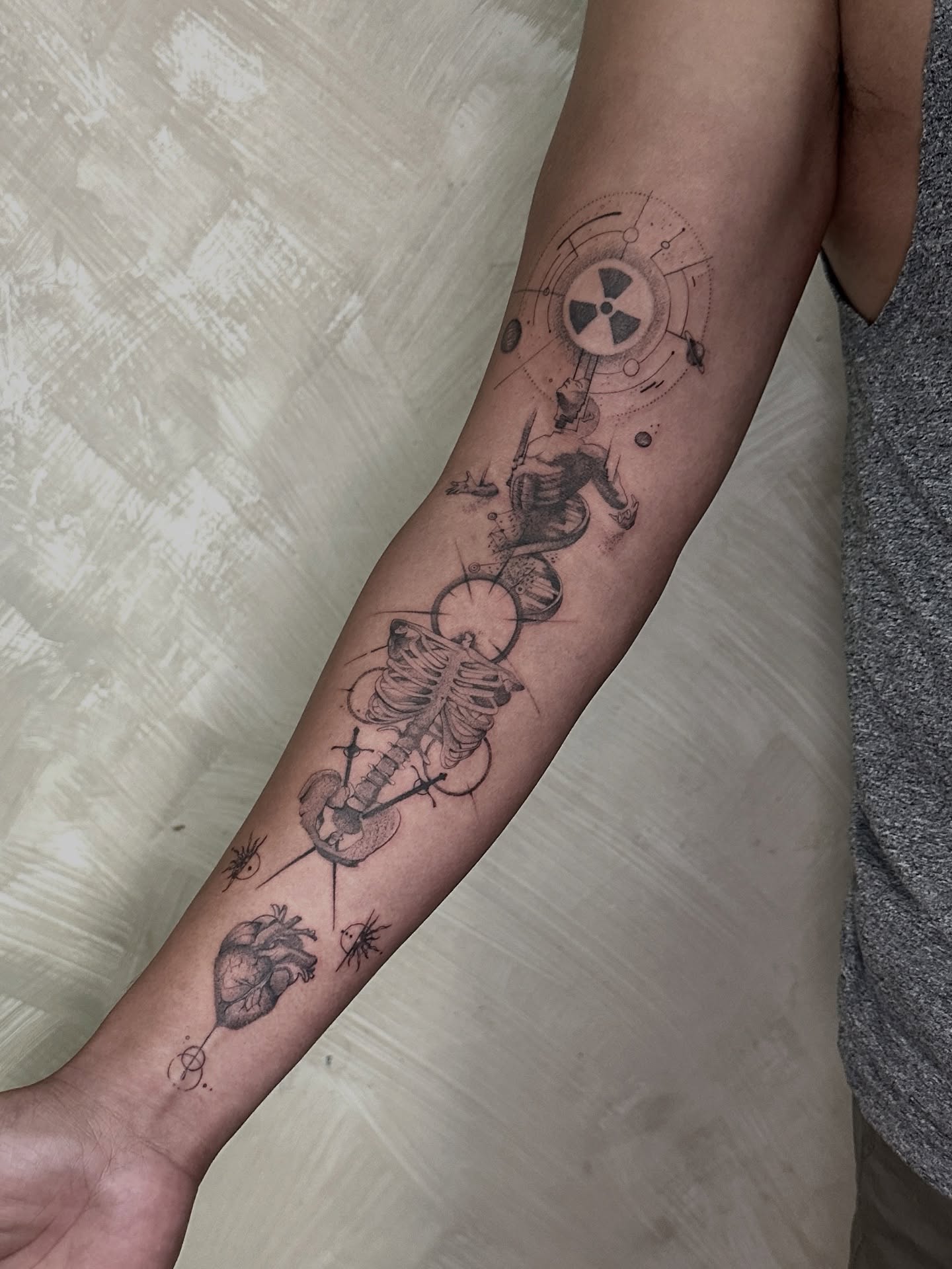 Medical imagery realism tattoo on the forearm by Arhem Quiambao