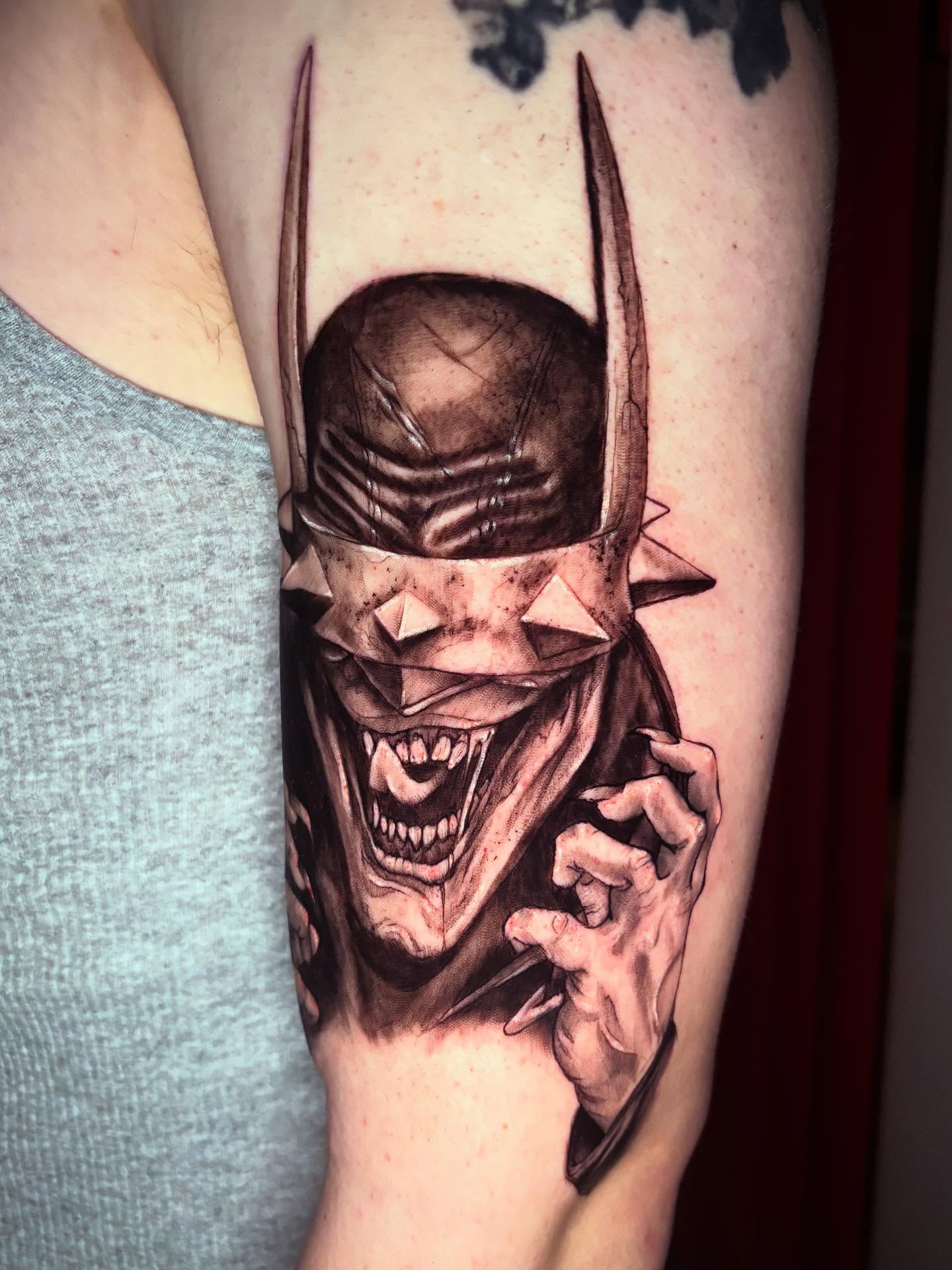 Batman dark realism tattoo on the forearm by Kayla