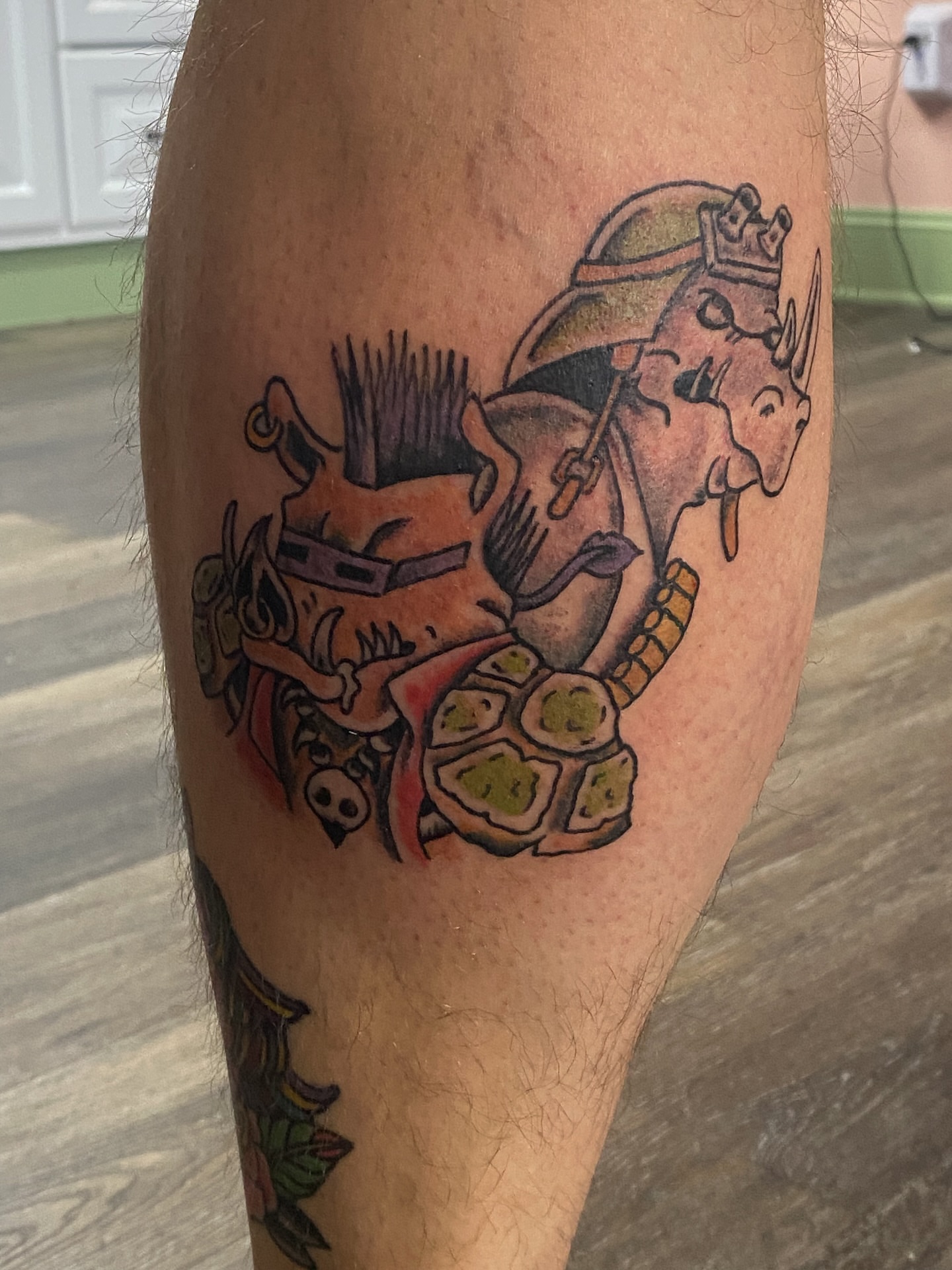 Rhino and rider new school tattoo on the leg by Giuseppe T.C.