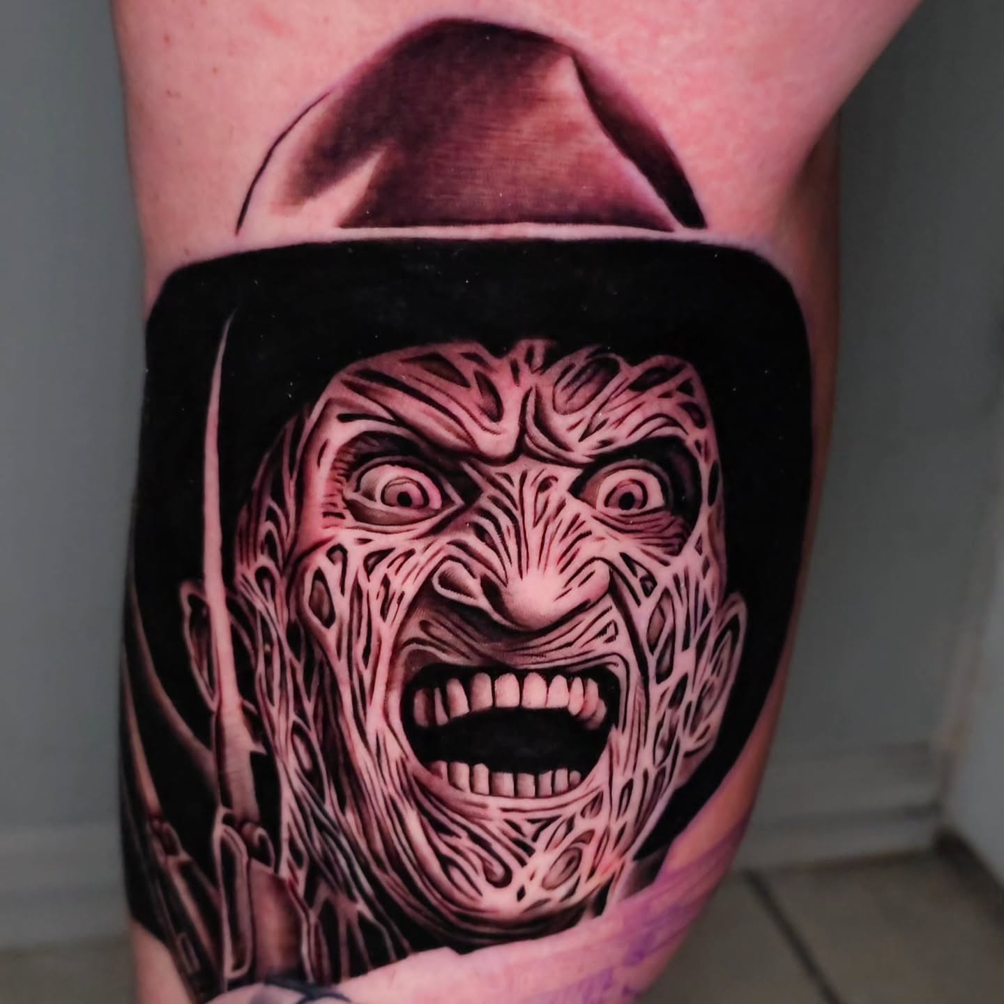 Freddy Krueger dark realism tattoo on the thigh by Javier M Davila