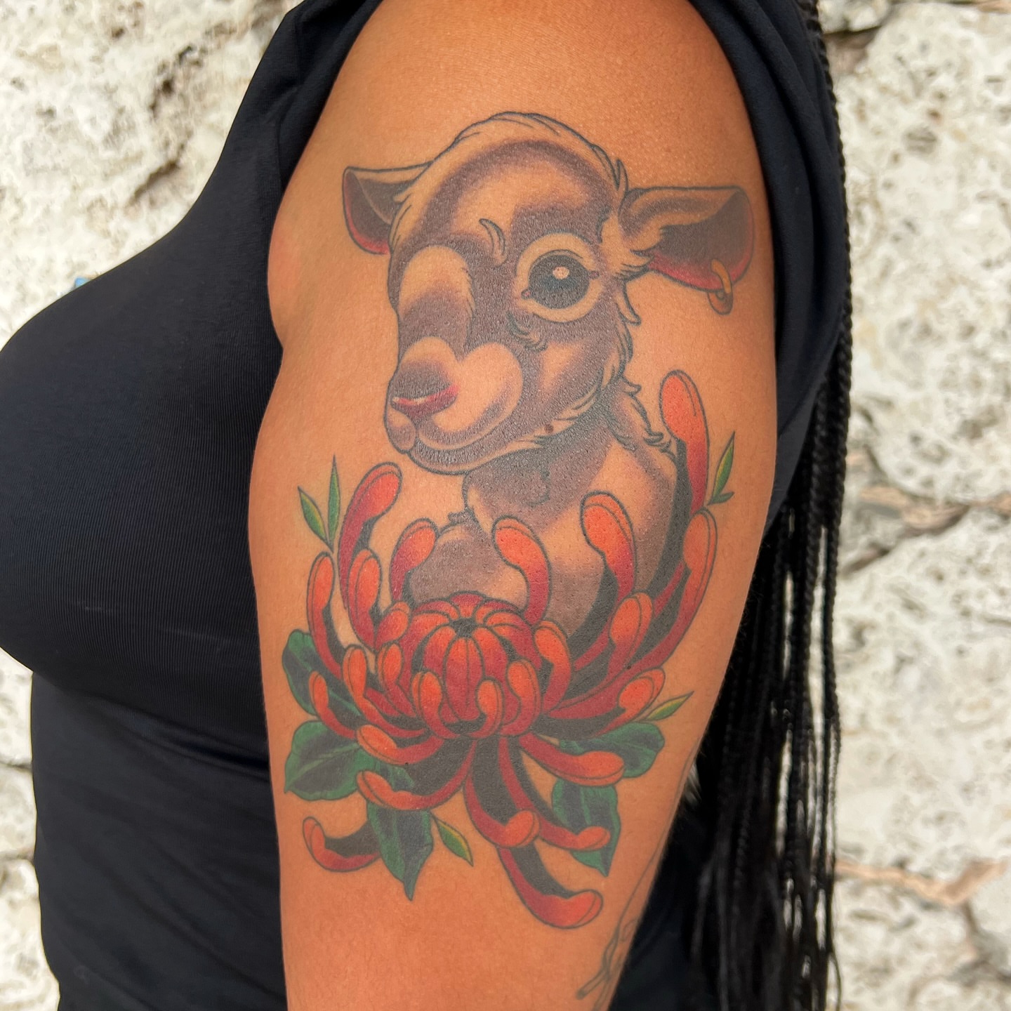 Cow and flower American traditional tattoo on the shoulder by zoey sage ✦