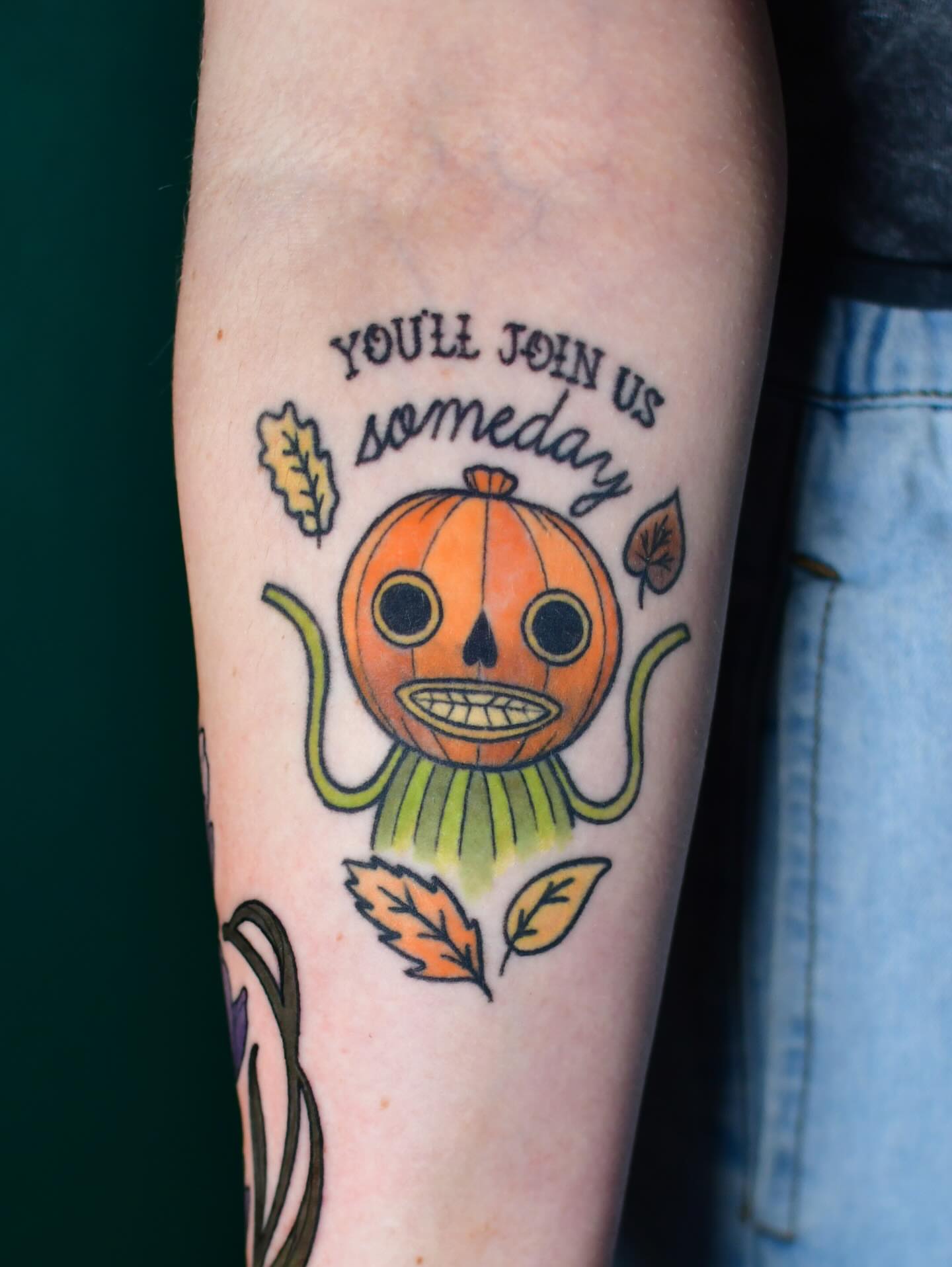 Pumpkin skull watercolor tattoo on the forearm by Karina πΌ Orange County Tattoo Artist