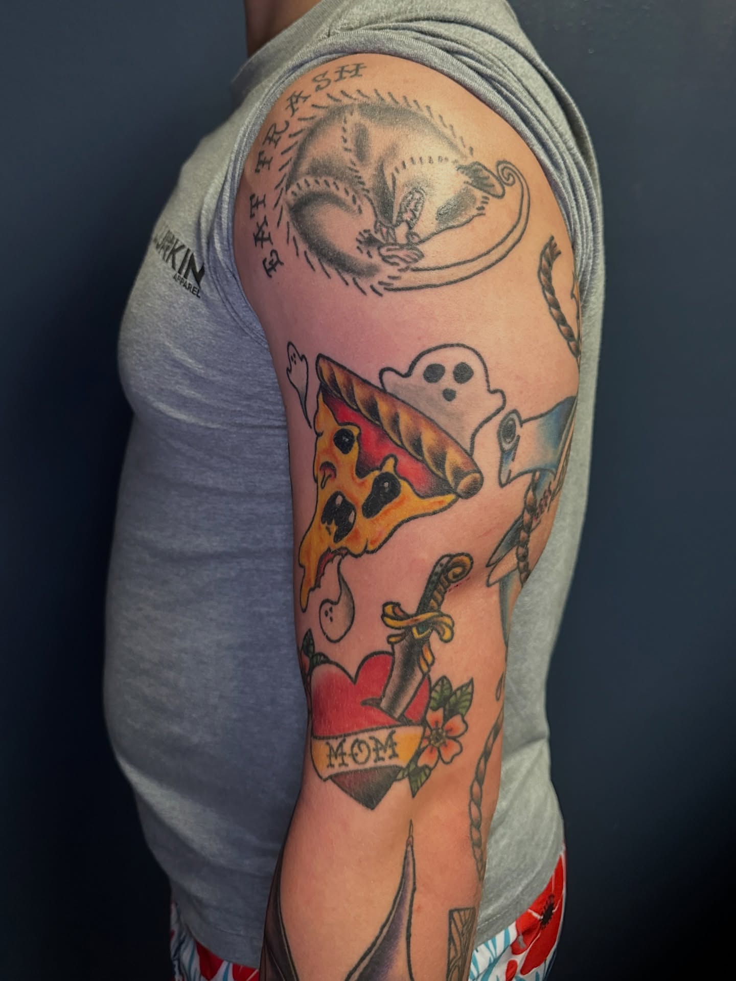 Pizza slice American traditional tattoo on the upper arm by Maggie De La Torre ๐ณ๏ธโโง๏ธ๐ฒ๐ฝ