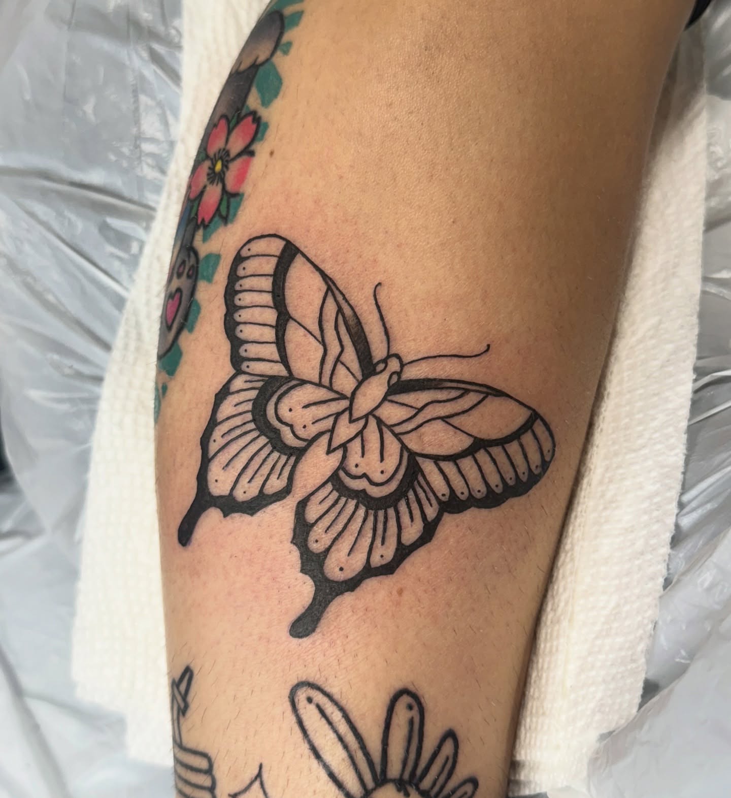 Butterfly black and grey tattoo on the forearm by Béle Benard