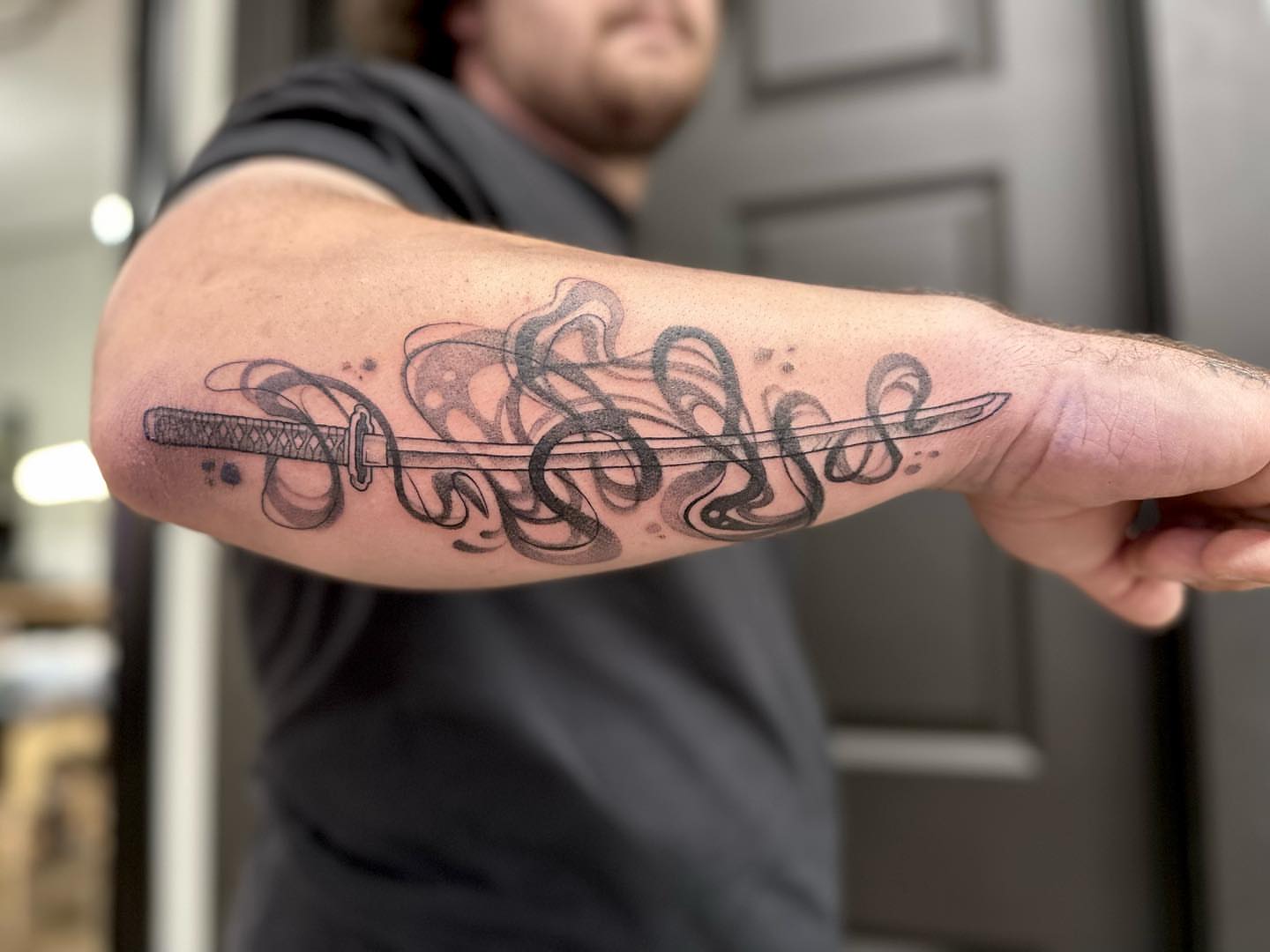 Katana and calligraphy lettering script tattoo on the forearm by Ciera High l Tattoo Artist