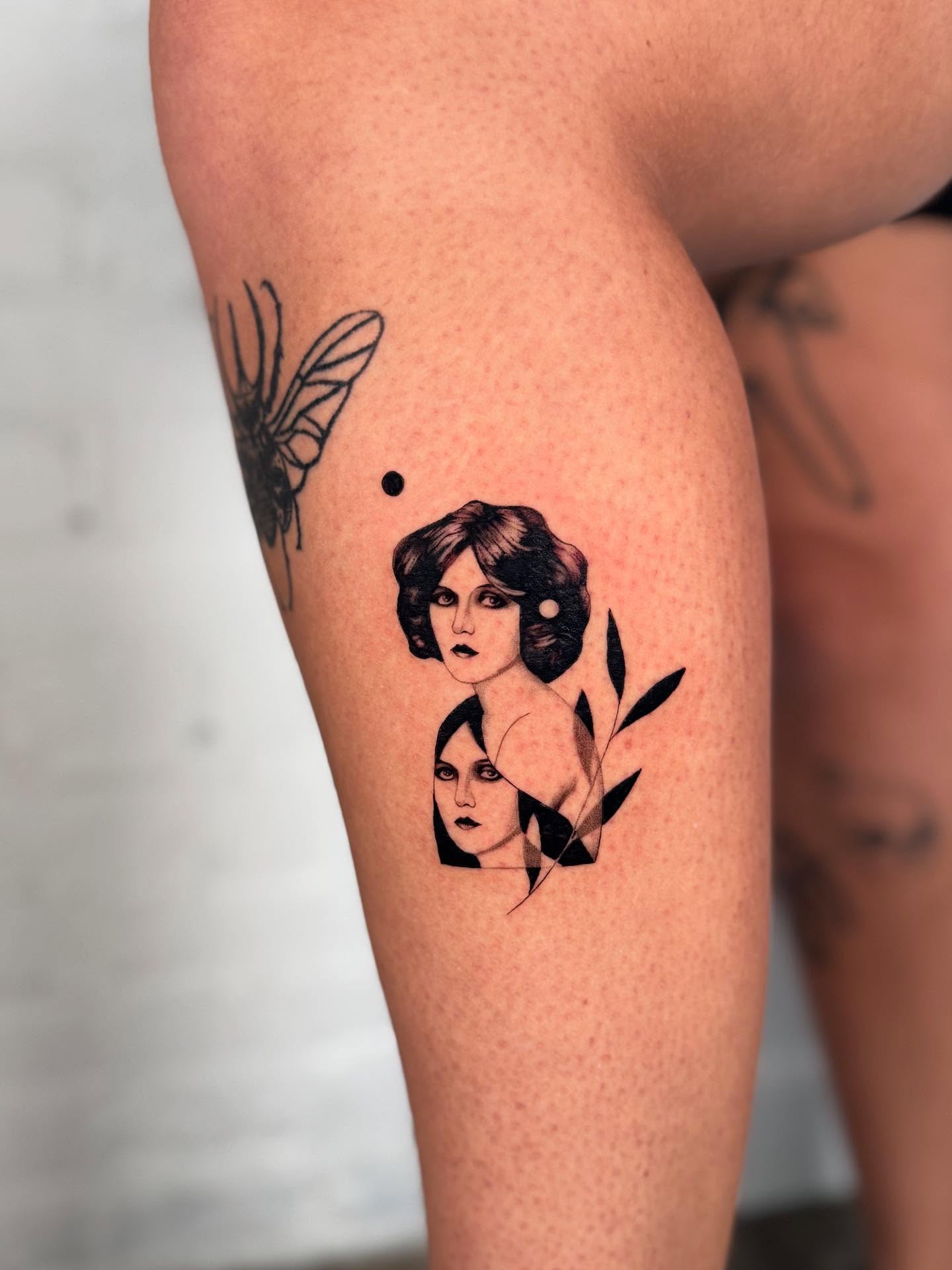 Female portraits geometric tattoo on the thigh by Hayley Jude