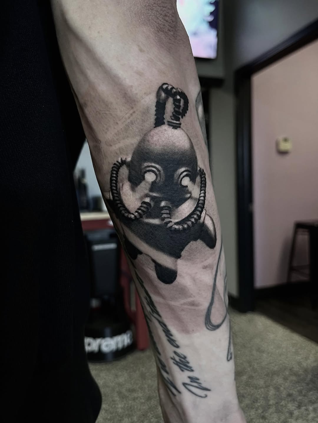 Tattoo by @thinkinkjr — black_and_grey, realism