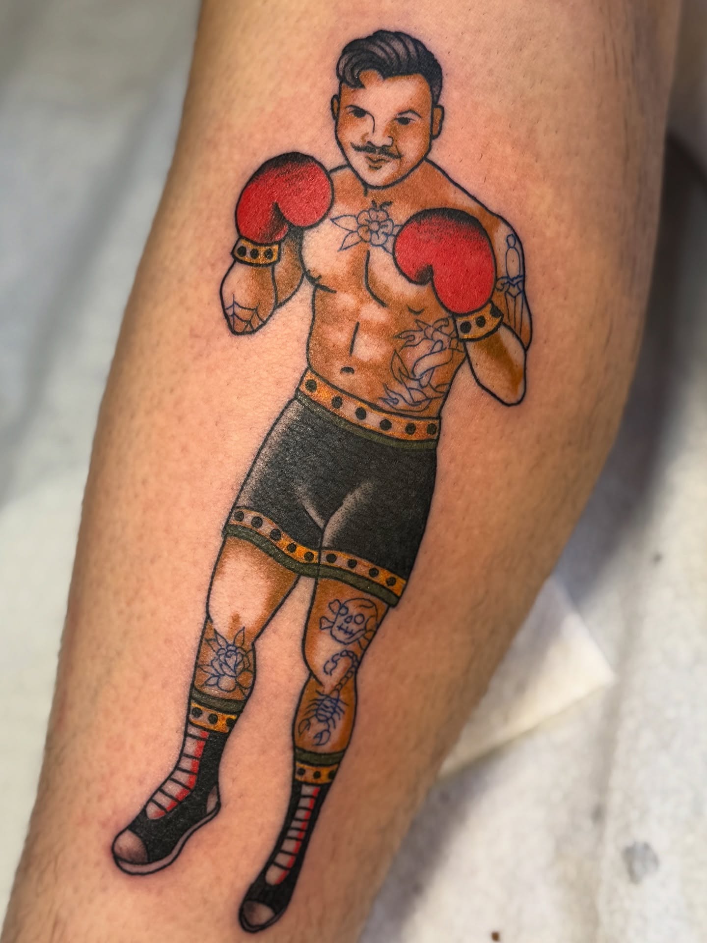 Boxing man American traditional tattoo on the forearm by Devin Derbes