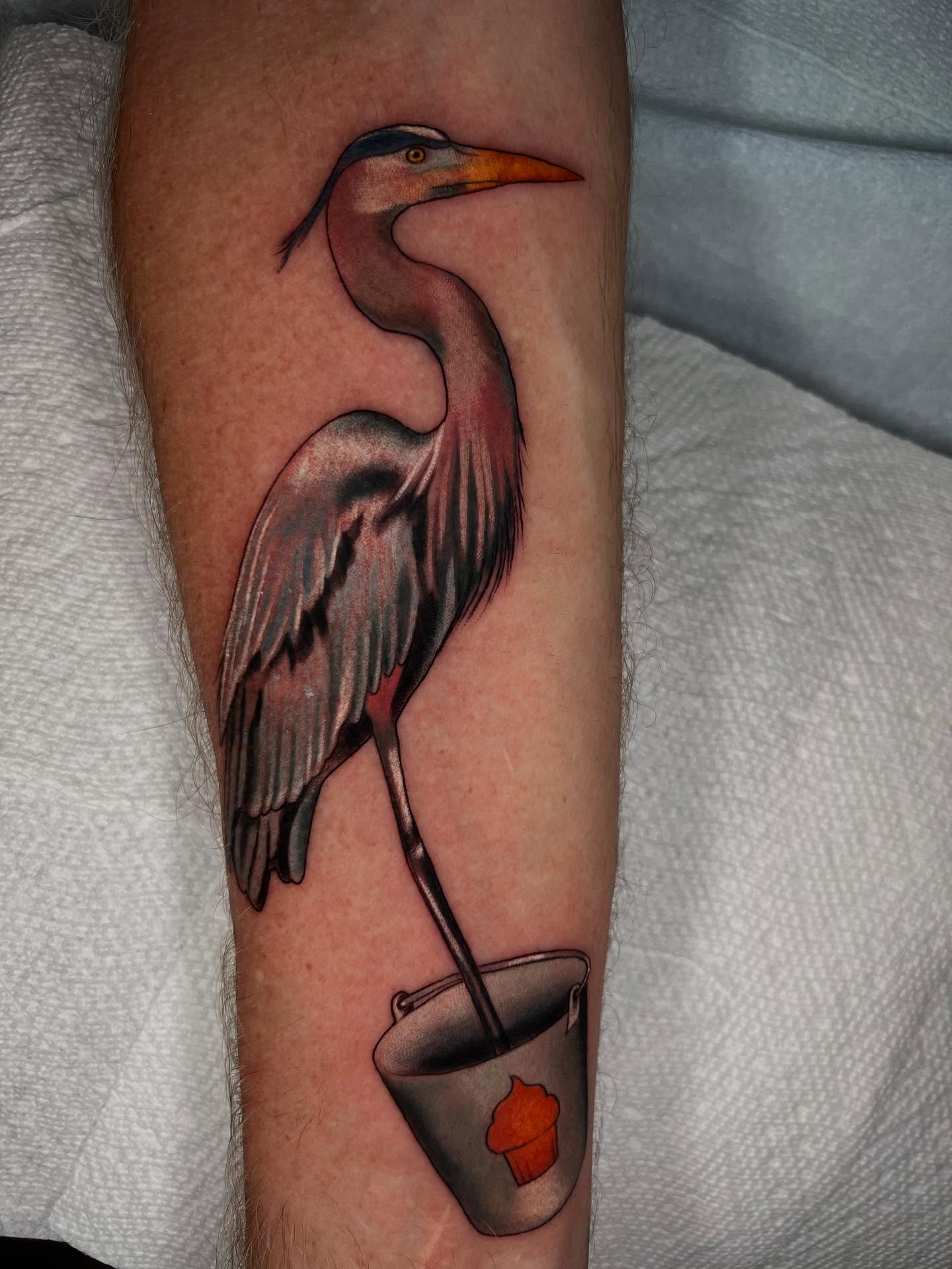 Heron American traditional tattoo on the forearm by High Vibrations