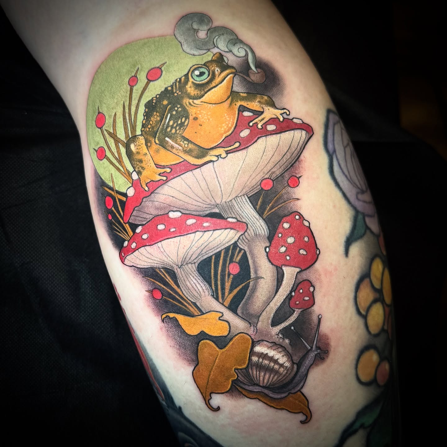Frog and mushrooms dotwork tattoo on the forearm by Jessica Brown
