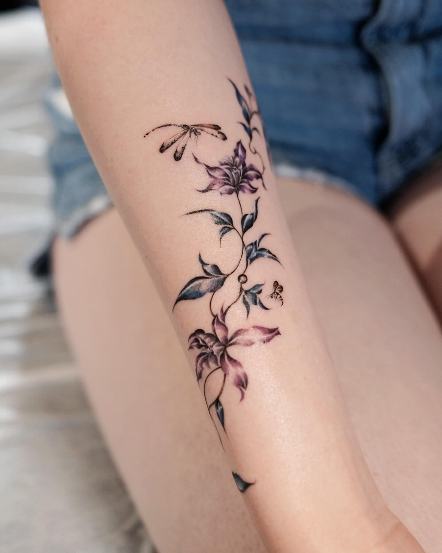 Lily and dragonfly new school tattoo on the forearm by 애박 ⋆⁺₊ ₊⁺⋆ Aebak