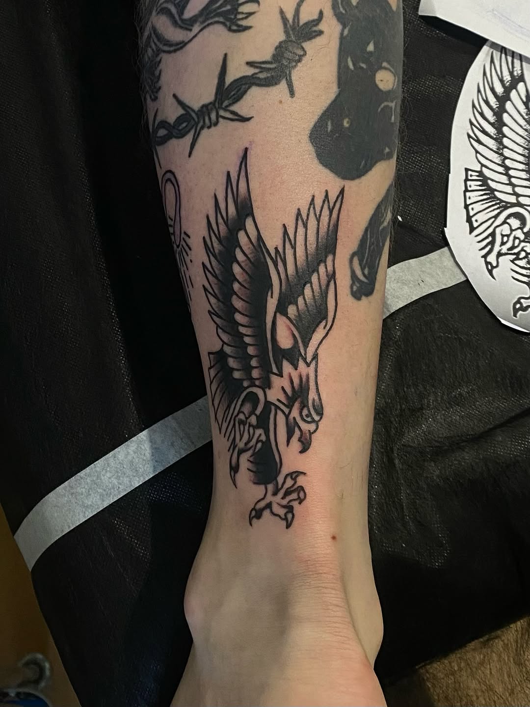 Eagle realism tattoo on the forearm by John, Kyiv, Ukraine