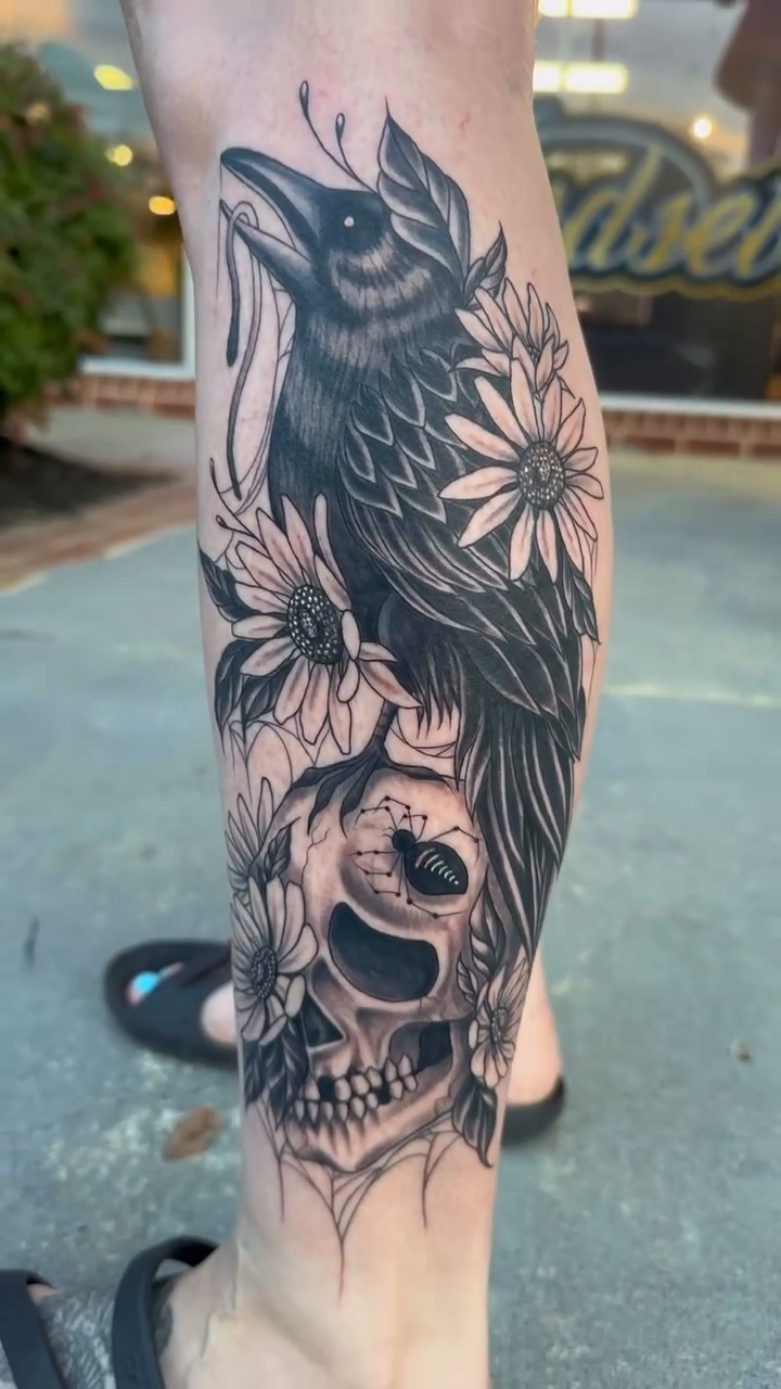 Raven and skull tattoo realism tattoo on the forearm by Maggie George