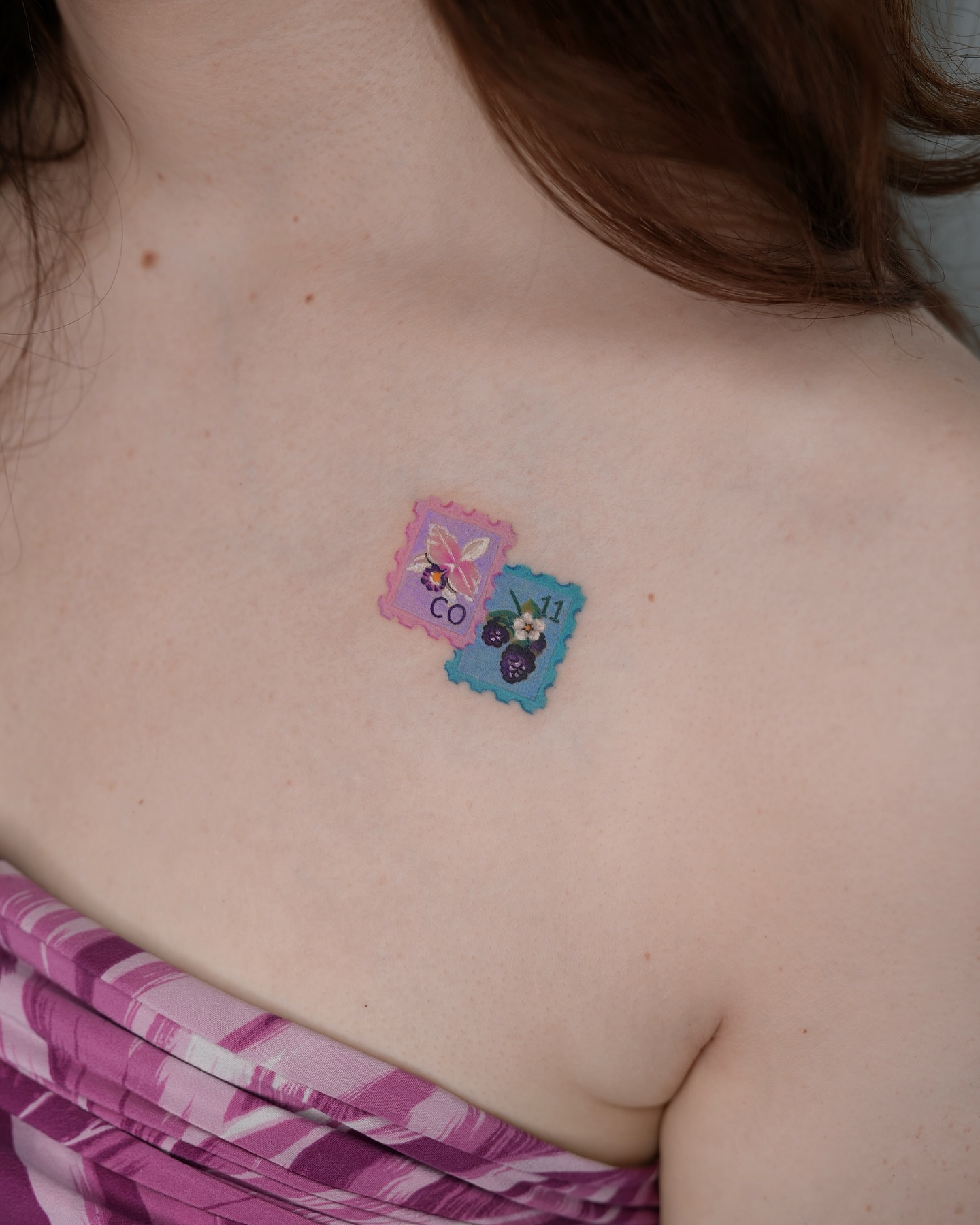 Postage stamp dotwork tattoo on the chest by 라이브 Live