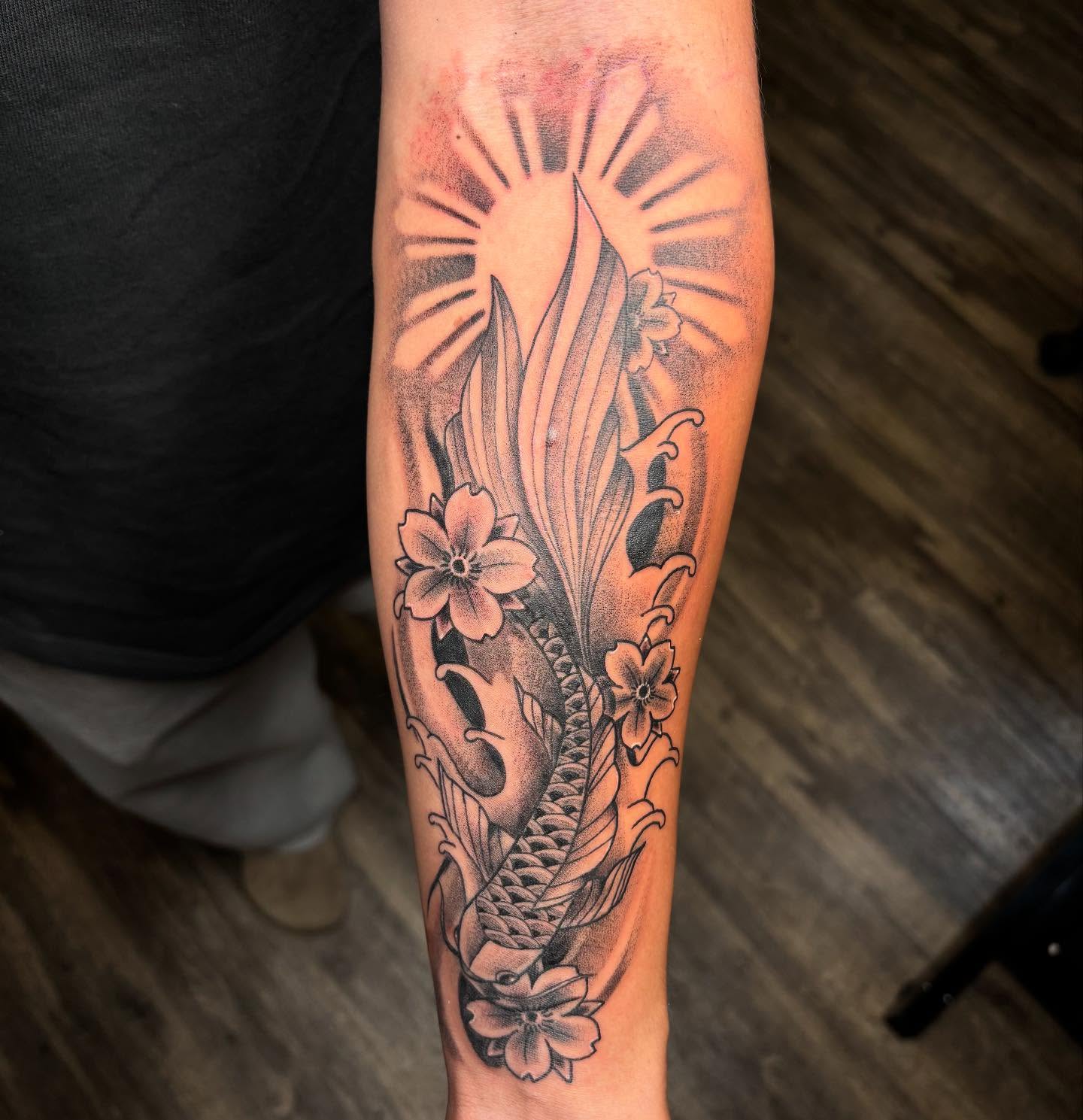 Koi fish and flowers japanese irezumi tattoo on the forearm by @seibastattoos, Virginia Beach, Virginia
