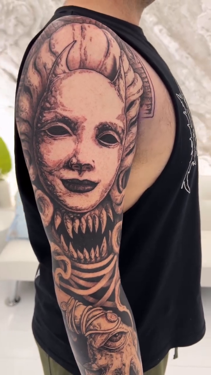 Mask and skull sleeve dark realism tattoo by Hollow Priest