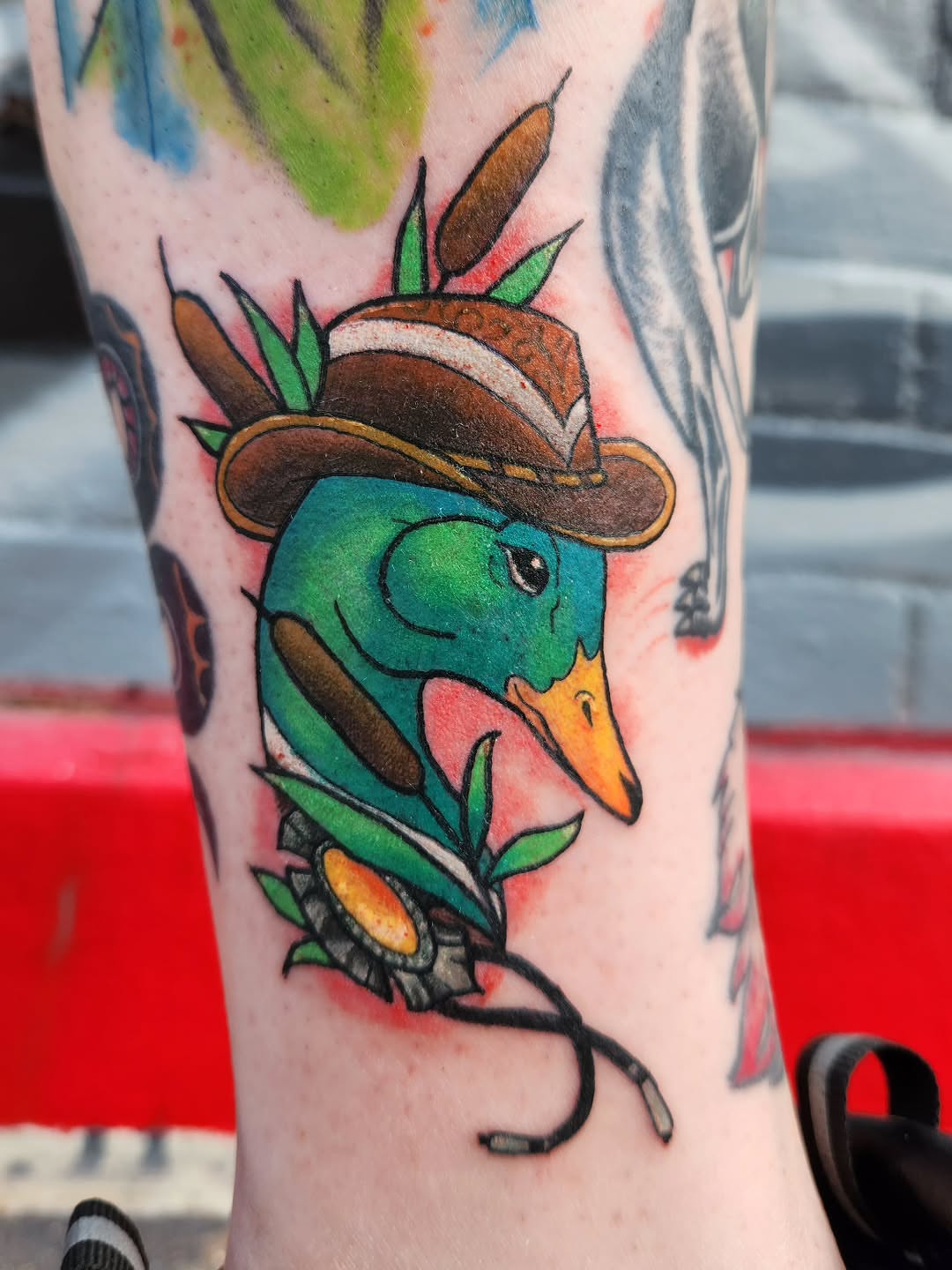 Duck wearing a cowboy hat American traditional tattoo on the forearm by Samantha Von Zombia, Saint Paul, Minnesota